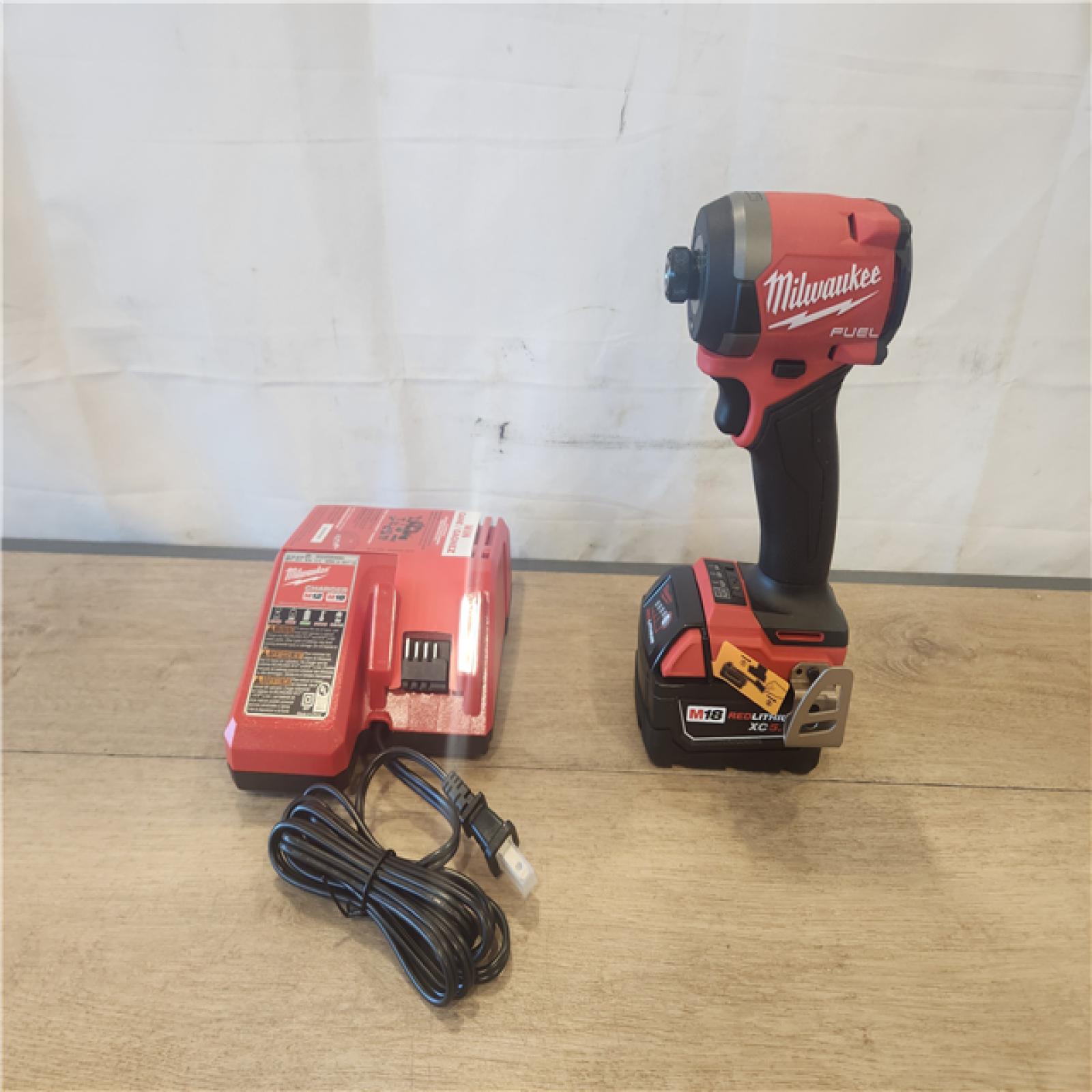 AS-IS- Milwaukee FUEL 18V Lithium-Ion Brushless Cordless 1/4 in. Hex Impact Driver Kit