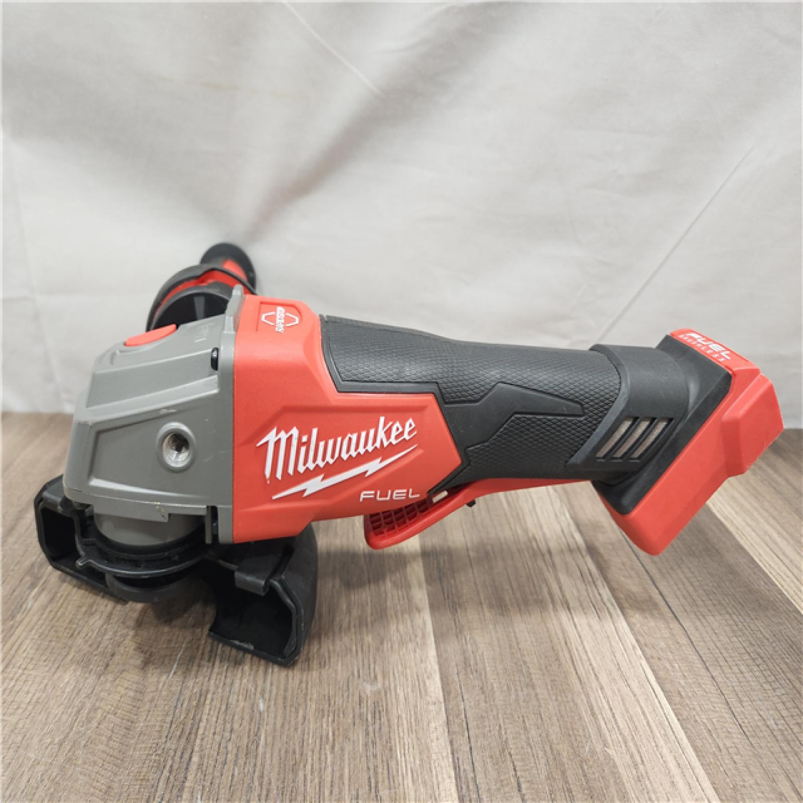 AS-IS- Milwaukee FUEL 18-Volt Lithium-Ion Brushless Cordless 4-1/2 in./5 in. Grinder W/Paddle Switch (Tool-Only)