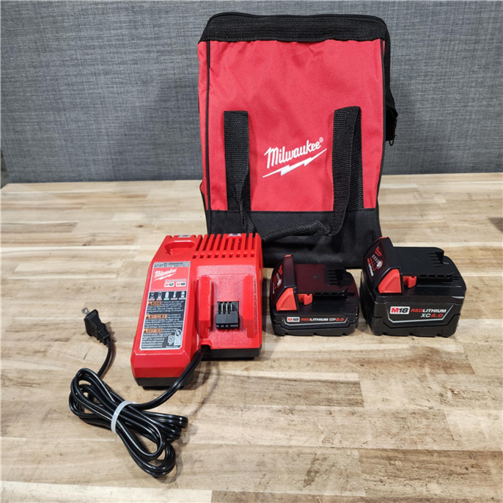 HOUSTON LOCATION - AS-IS M18 18-Volt Lithium-Ion Brushless Cordless Compact Hammer Drill/Impact Combo Kit (2-Tool) with (2) Batteries  Bag