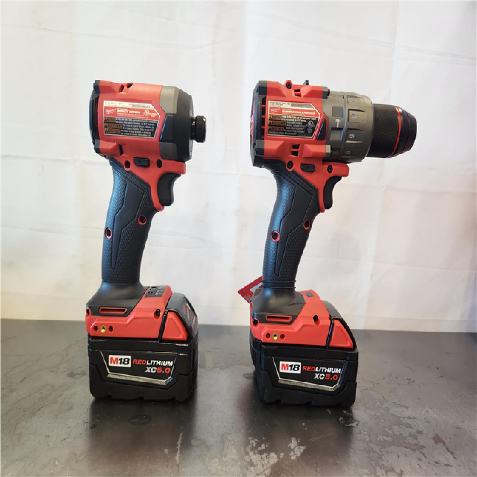 AS-IS- Milwaukee FUEL 18V Lithium-Ion Brushless Cordless Hammer Drill and Impact Driver Combo Kit