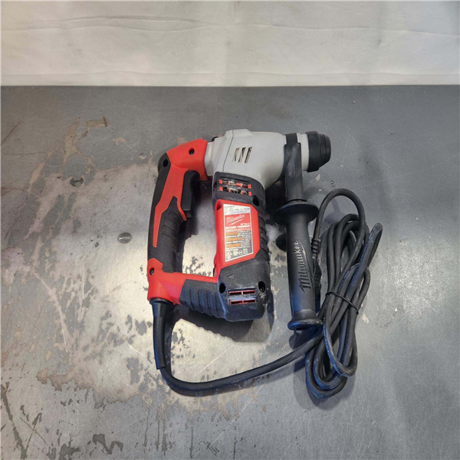 AS-IS- Milwaukee 5.5 Amp 5/8 in. Corded SDS-plus Concrete/Masonry Rotary Hammer Drill Kit with Case