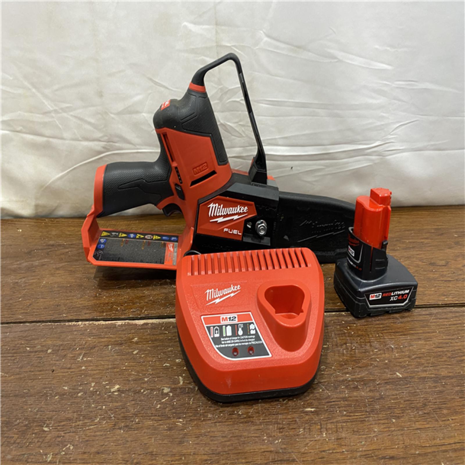 AS-IS Milwaukee-2527-21 M12 FUEL HATCHET 6in. Pruning Saw Kit