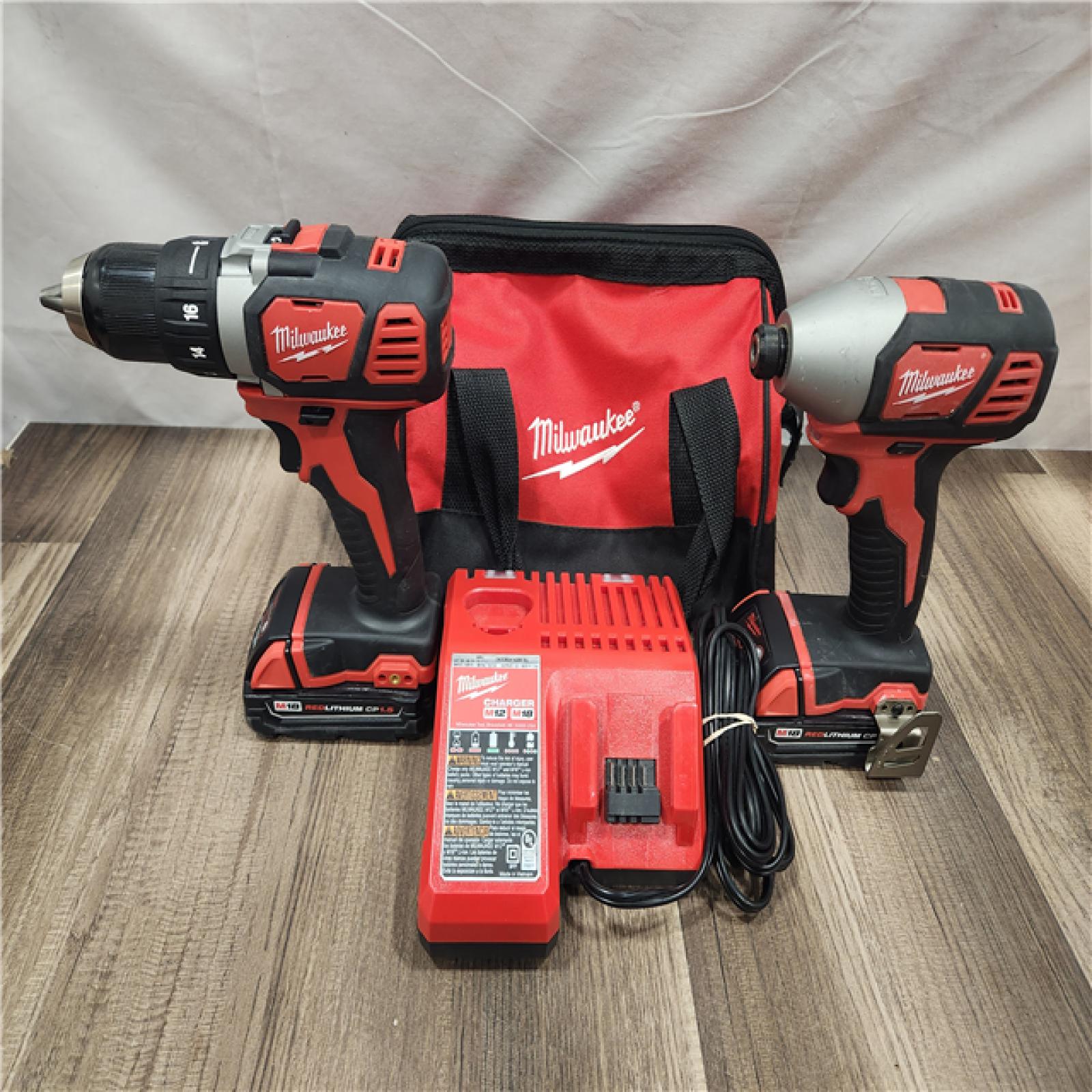 AS-IS- Milwaukee 18V Cordless Brushed 2-Tool Drill/Driver and Impact Driver Kit