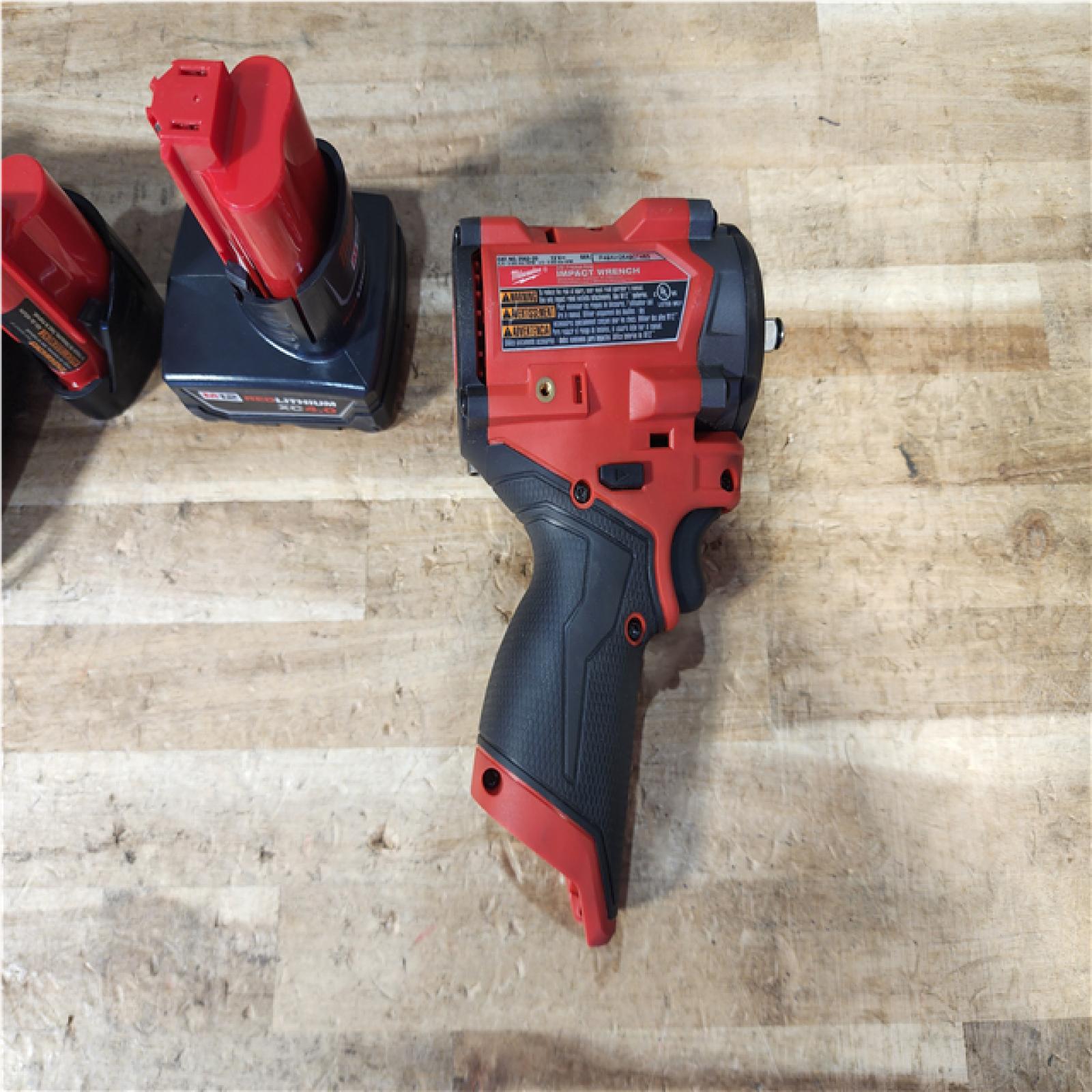 HOUSTON LOCATION - AS - IS Milwaukee FUEL 12V Li-Ion Brushless Cordless Stubby 3/8 in. Impact Wrench Kit