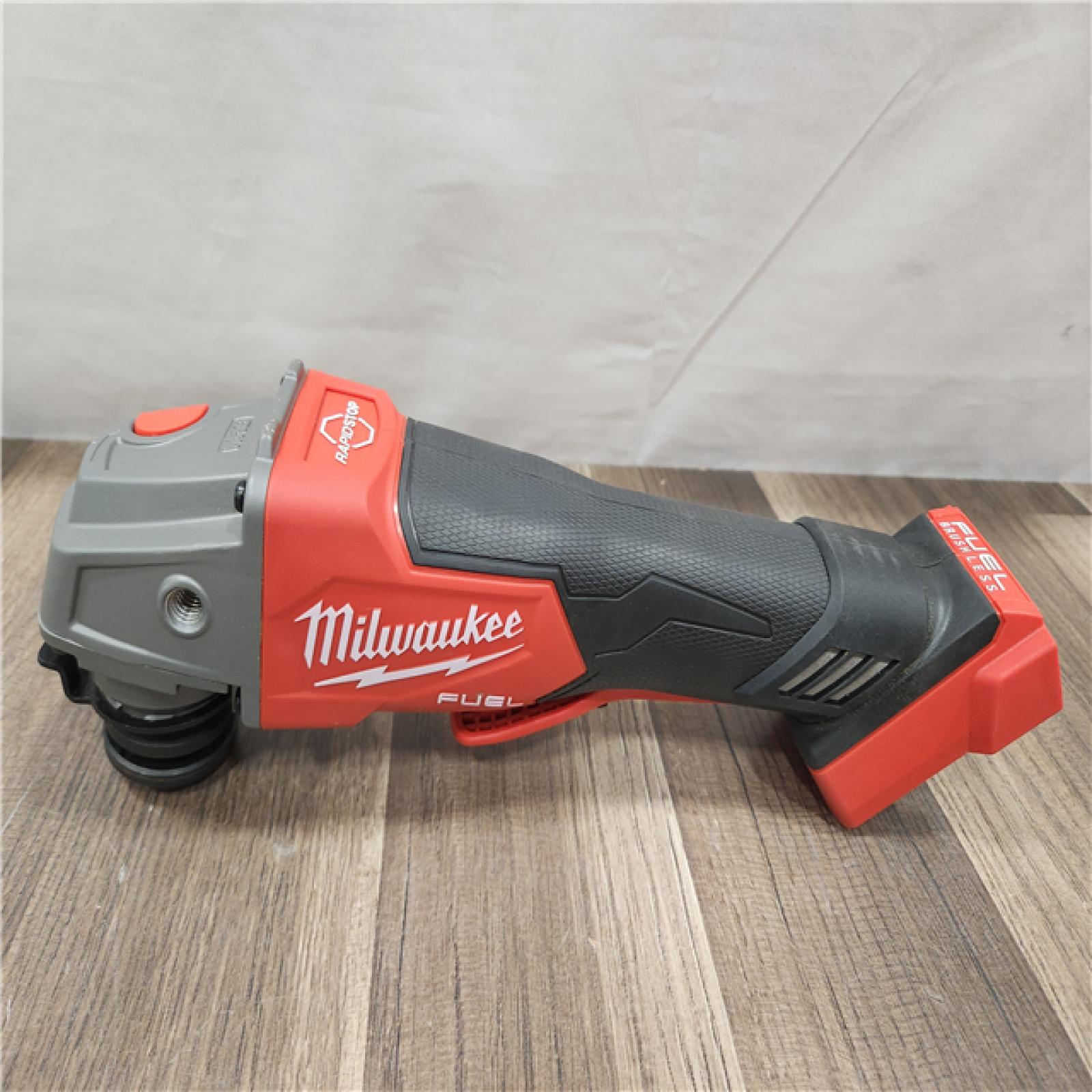 AS-IS- Milwaukee FUEL 18-Volt Lithium-Ion Brushless Cordless 4-1/2 in./5 in. Grinder W/Paddle Switch (Tool-Only)
