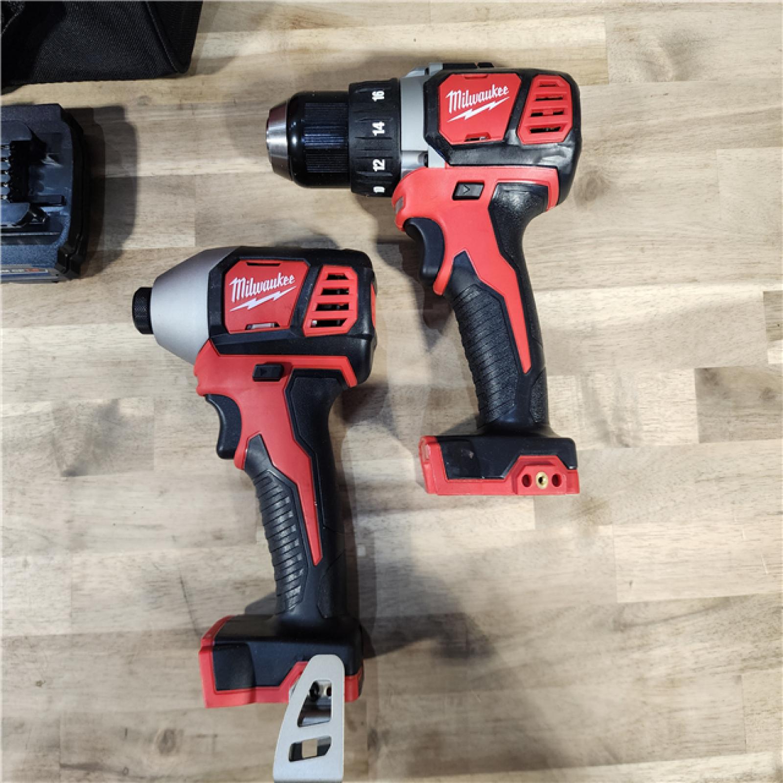 HOUSTON LOCATION - AS-IS Milwaukee M18 18V Cordless Brushed 2 Tool Drill/Driver and Impact Driver Kit