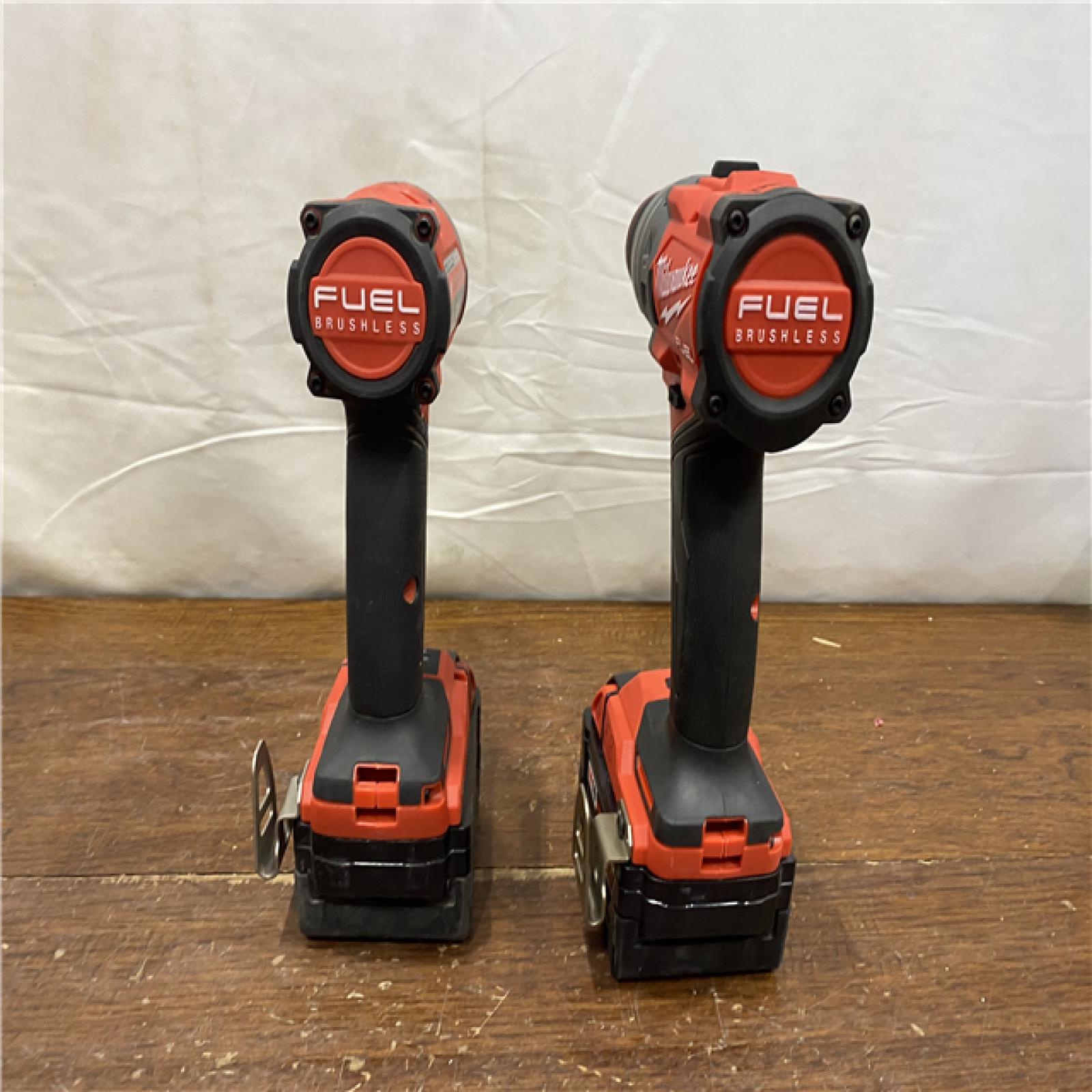 AS-IS MILWAUKEE M18 FUEL 18V Lithium-Ion Brushless Cordless Hammer Drill and Impact Driver Combo Kit (2-Tool) with 2 Batteries