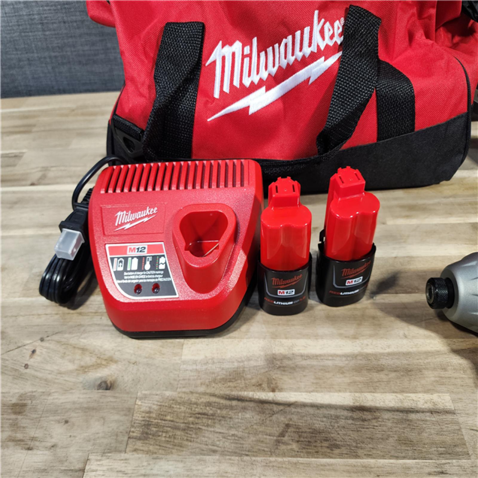 HOUSTON LOCATION - AS-IS (APPEARS LIKE NEW) MILWAUKEE M12 12V Lithium-Ion Cordless Combo Kit (5-Tool) with Two 1.5Ah Batteries, Charger & Tool Bag