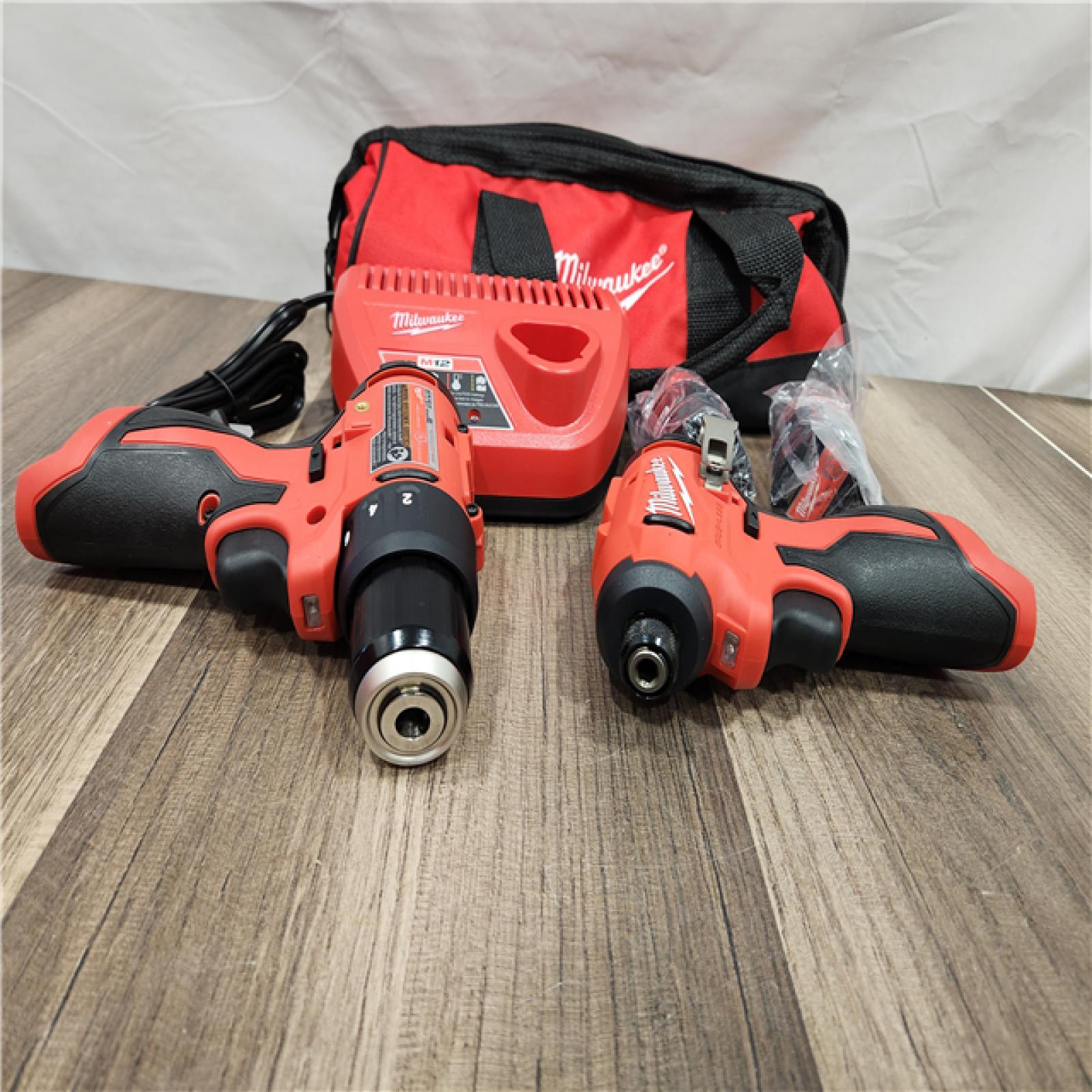 AS-IS Milwaukee M18 FUEL 18V Lithium-Ion Brushless Cordless Hammer Drill and Impact Driver Combo Kit (2-Tool) with 2 Batteries