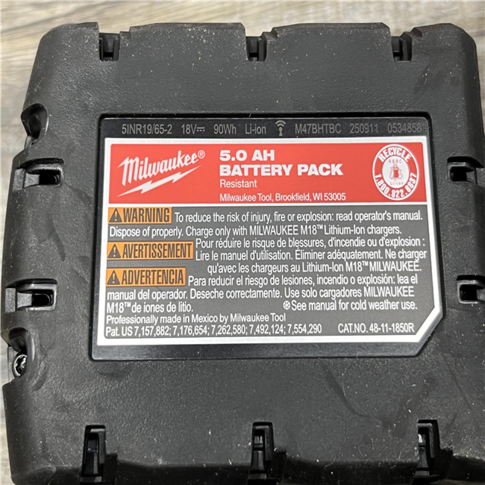 AS-IS Milwaukee 18-Volt Lithium-Ion XC Starter Kit with One 5.0Ah Battery and Charger