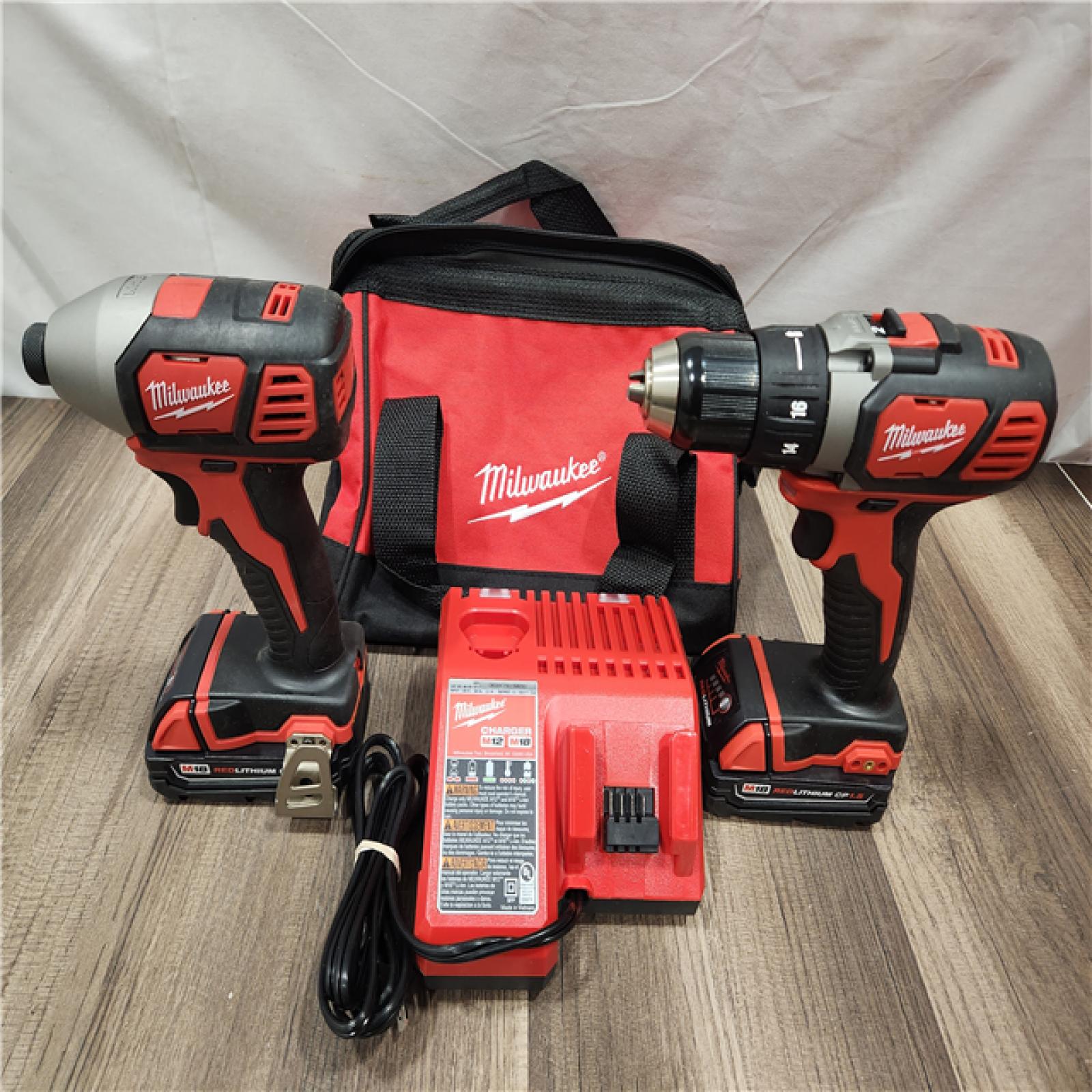 AS-IS- Milwaukee 18V Cordless Brushed 2-Tool Drill/Driver and Impact Driver Kit