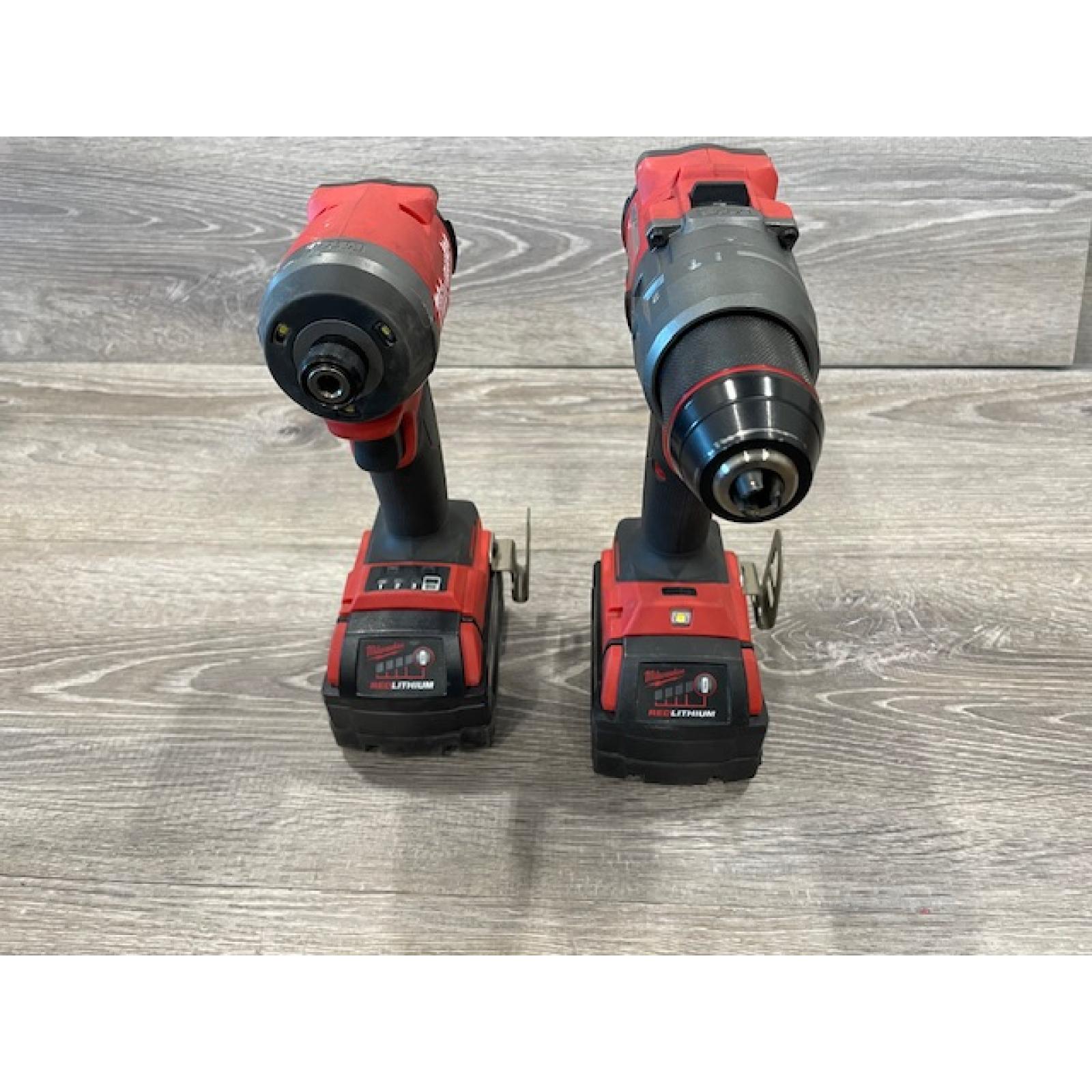 AS-IS Milwaukee FUEL 18V Lithium-Ion Brushless Cordless Hammer Drill and Impact Driver Combo Kit
