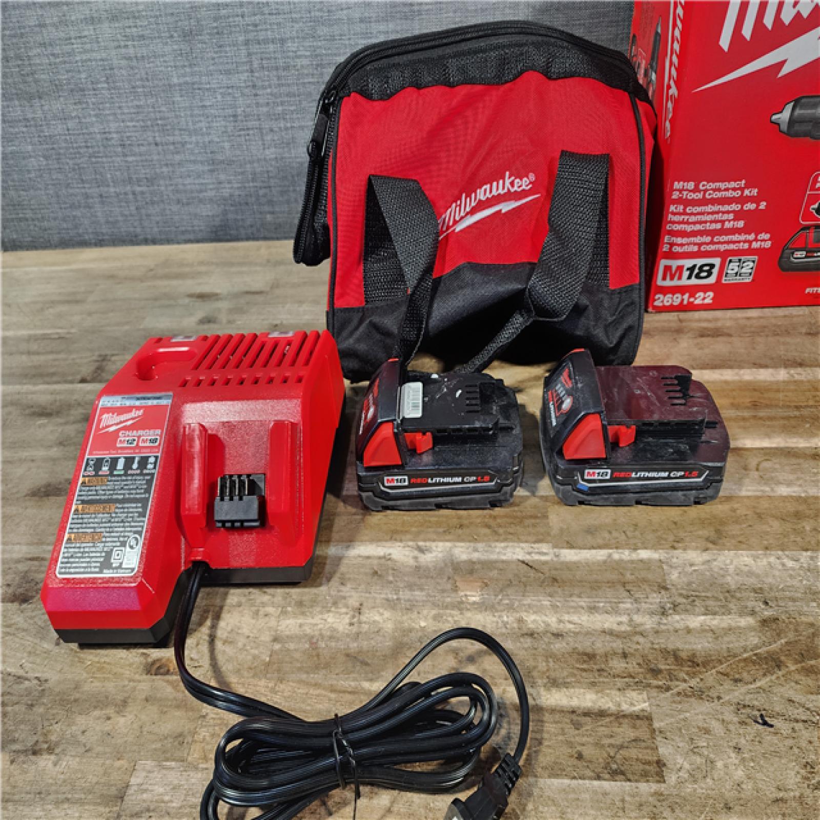 HOUSTON LOCATION - AS-IS Milwaukee 18V Lithium-Ion Cordless Drill Driver/Impact Driver Combo Kit