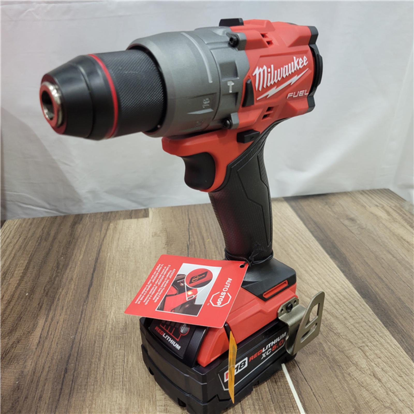 AS-IS Milwaukee Hammer Drill Driver Kit with Batteries  Charger & Tool Case  Red