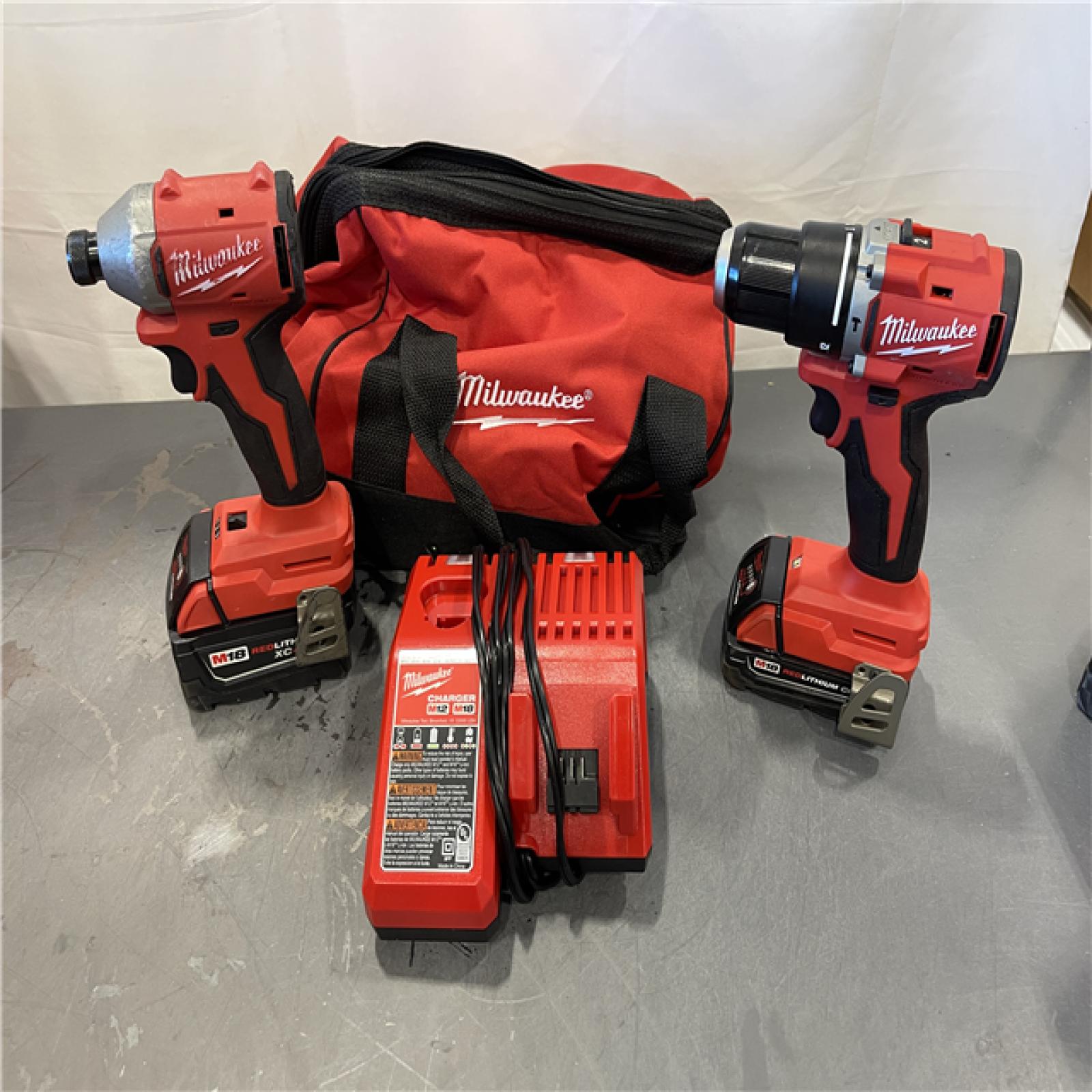 AS-IS - Milwaukee M18 18-Volt Lithium-Ion Brushless Cordless Compact Hammer Drill/Impact Combo Kit