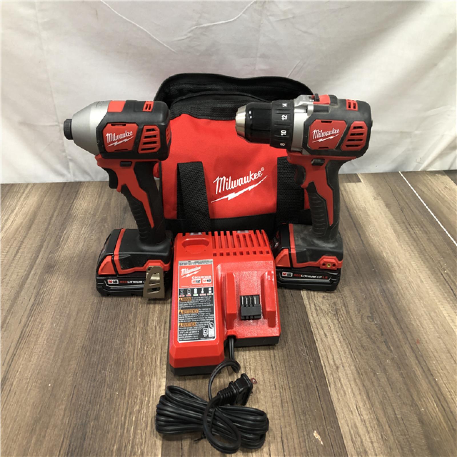 AS-IS Milwaukee M18 18V Lithium-Ion Cordless Drill Driver/Impact Driver Combo Kit