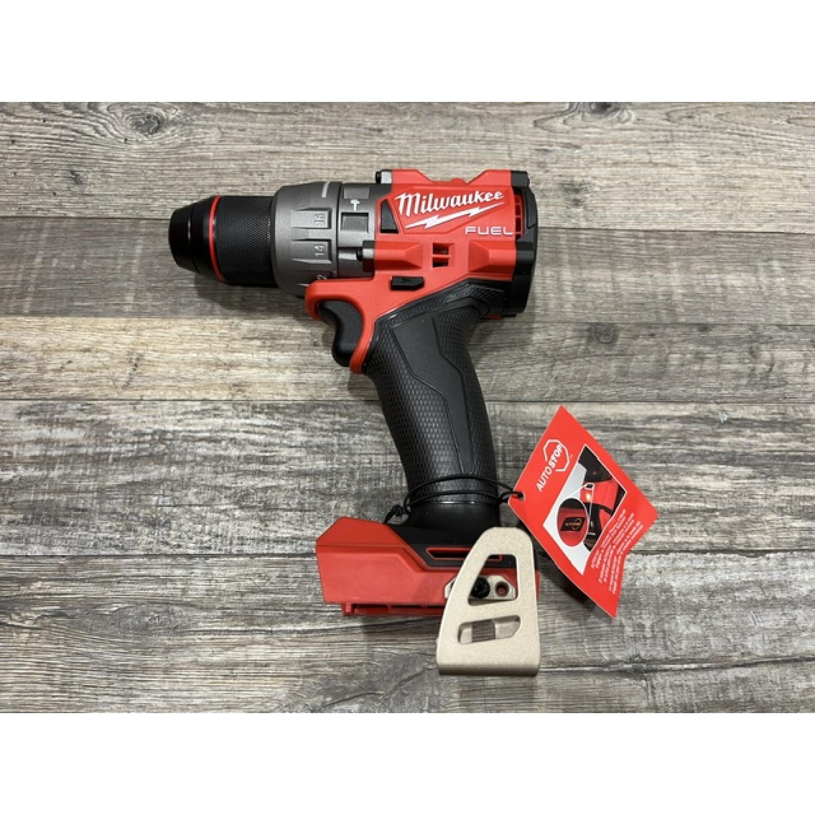 AS-IS Milwaukee FUEL 18V Lithium-Ion Brushless Cordless 1/2 in. Hammer Drill Driver Kit