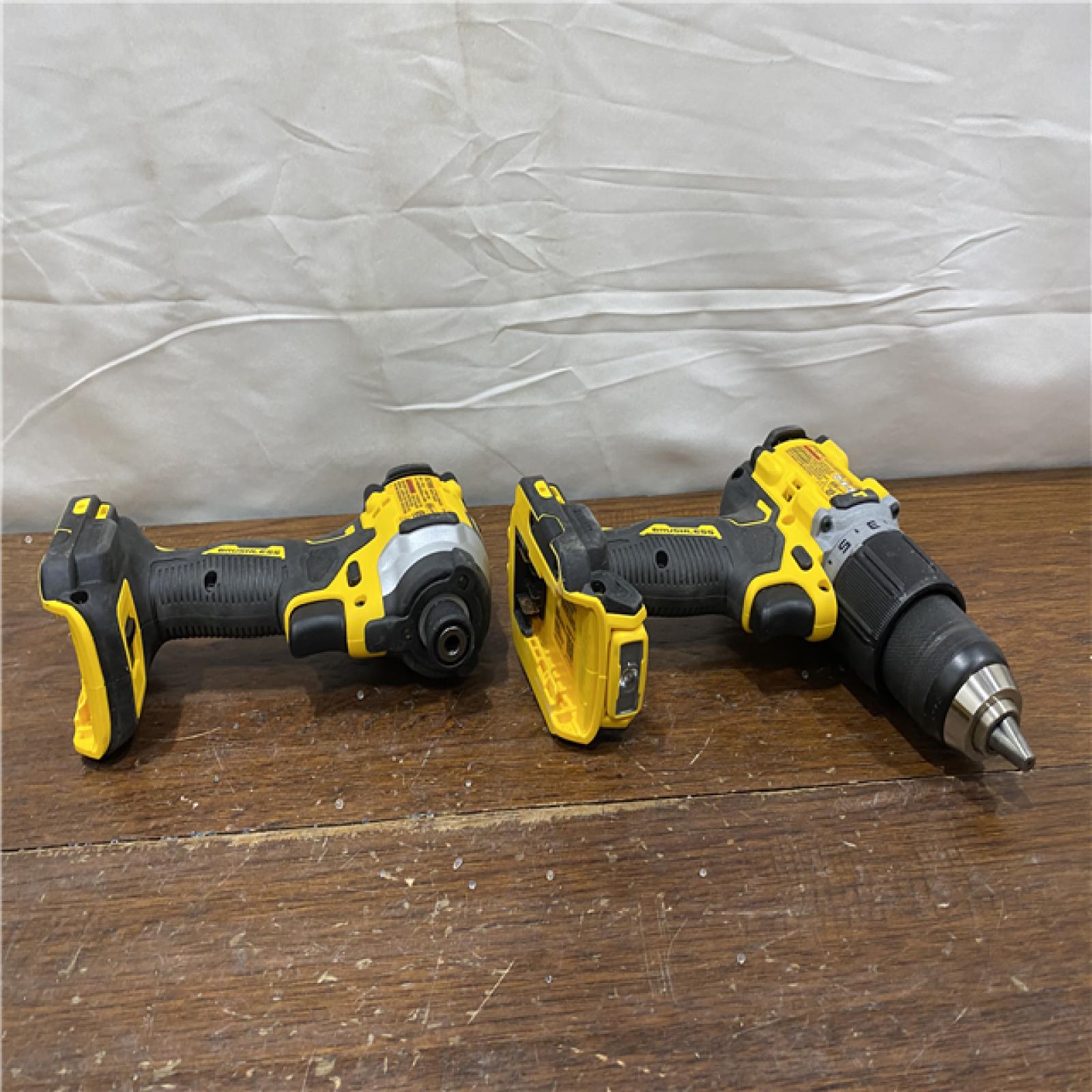 AS-IS DEWALT 20V MAX XR Hammer Drill and ATOMIC Impact Driver 2 Tool Cordless Combo Kit with (2) 4.0Ah Batteries, Charger, and Bag
