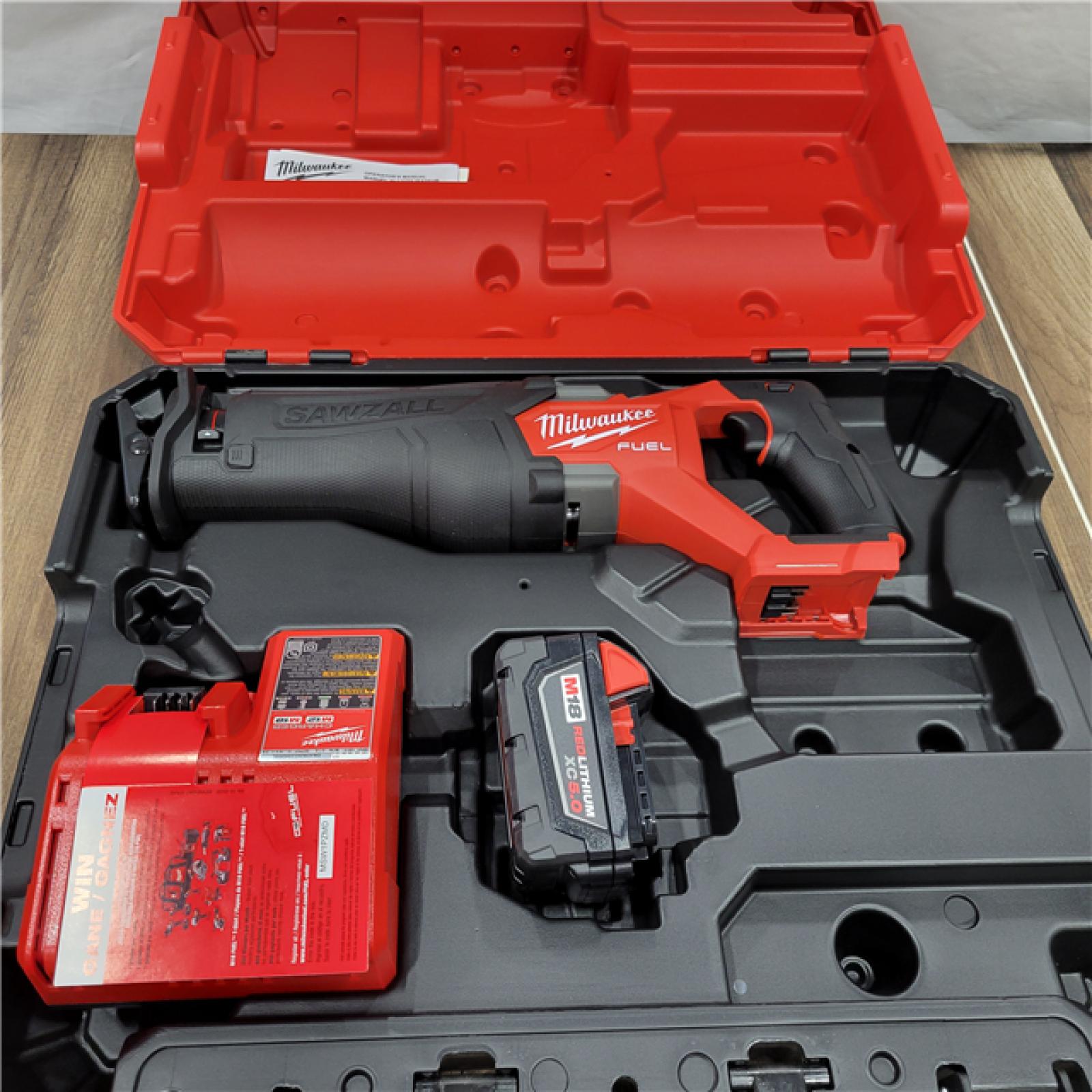 AS-IS MILWAUKEE M18 FUEL 18V Lithium-Ion Brushless Cordless SAWZALL Reciprocating Saw Kit W/one 5.0 Ah Batteries, Charger and Case