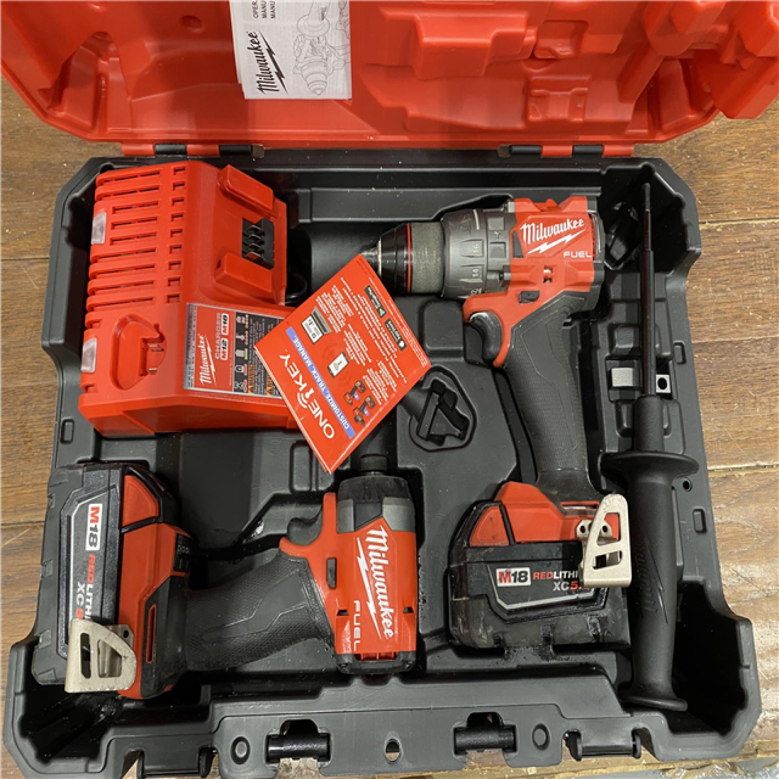 AS-IS M18 FUEL 18V Lithium-Ion Brushless Cordless Hammer Drill and Impact Driver Combo Kit (2-Tool) with 2 Batteries
