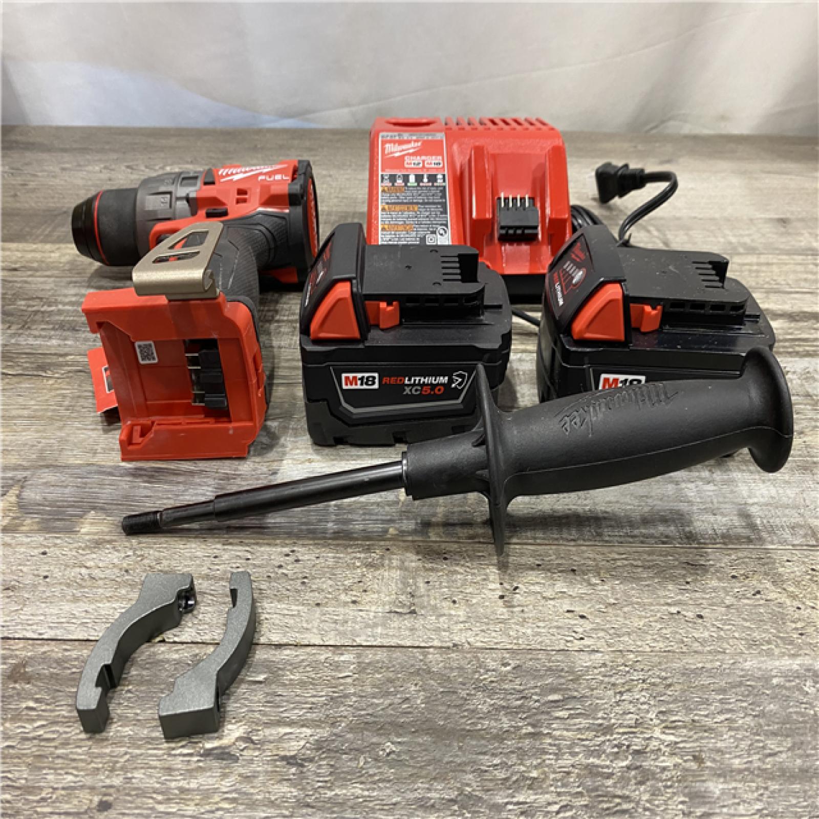 AS-IS Milwaukee FUEL 18V Lithium-Ion Brushless Cordless 1/2 in. Hammer Drill Driver Kit