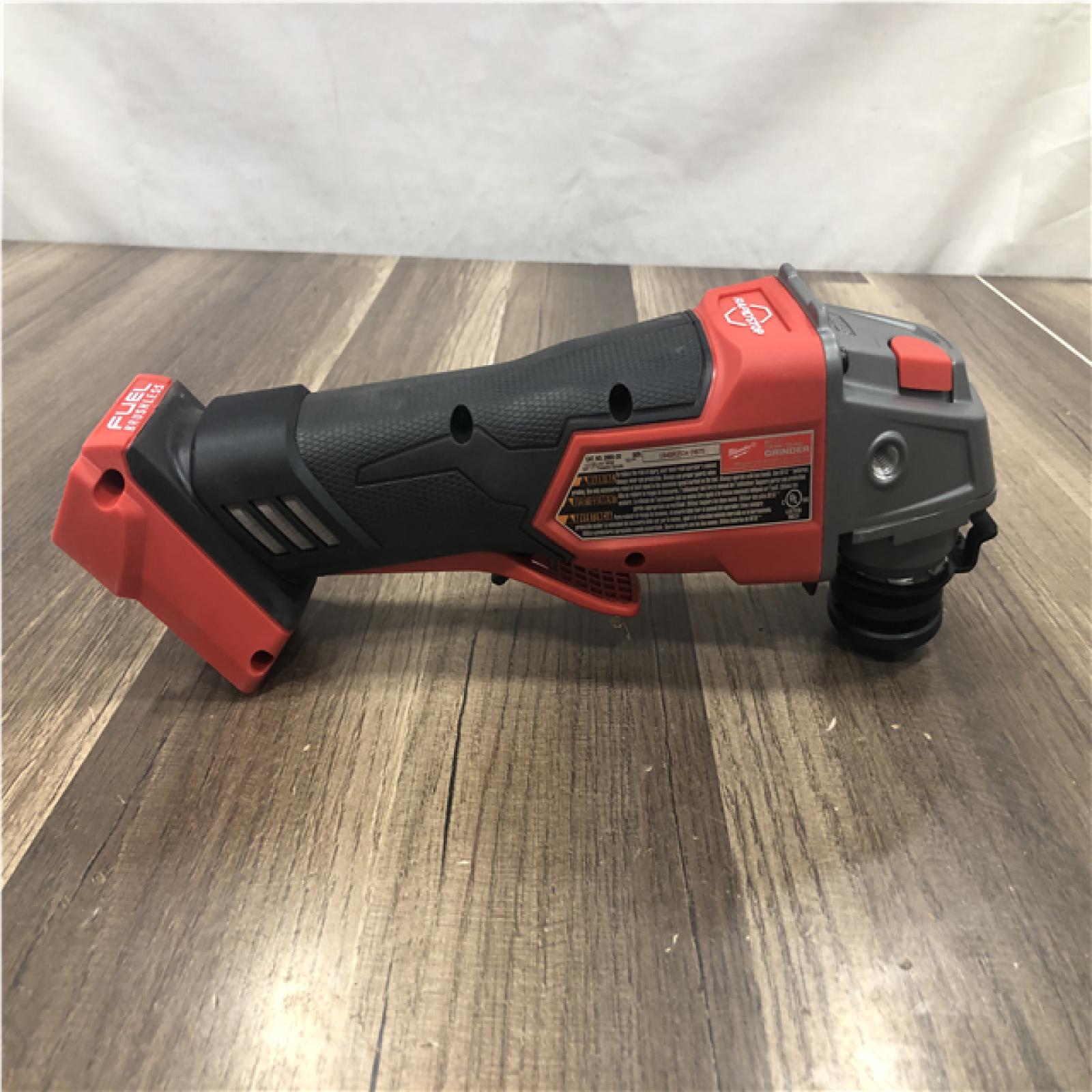 AS-IS Milwaukee FUEL 18V Lithium-Ion Brushless Cordless 4-1/2 in./5 in. Grinder w/Paddle Switch (Tool-Only)