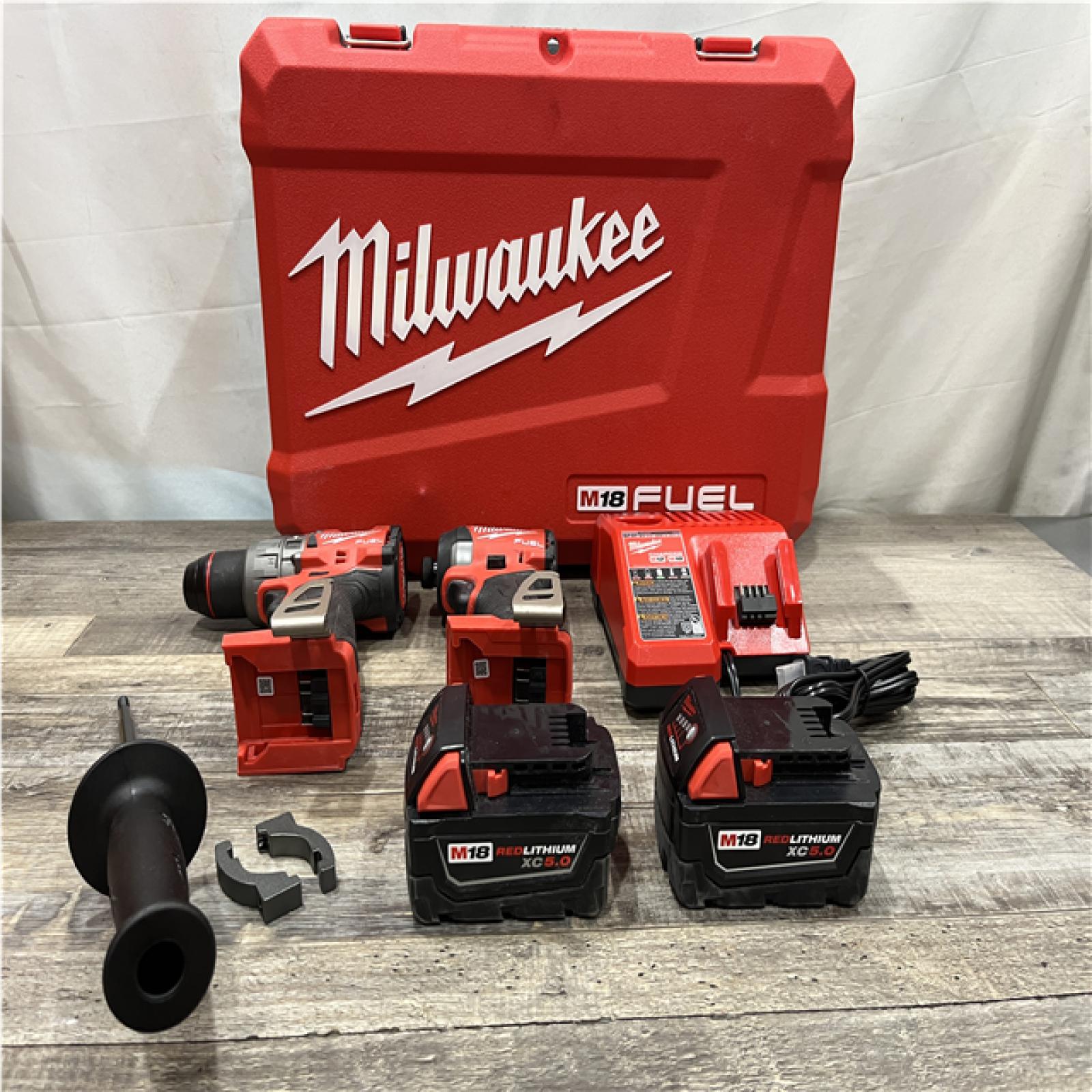 AS-IS Milwaukee FUEL 18V Lithium-Ion Brushless Cordless Hammer Drill and Impact Driver Combo Kit