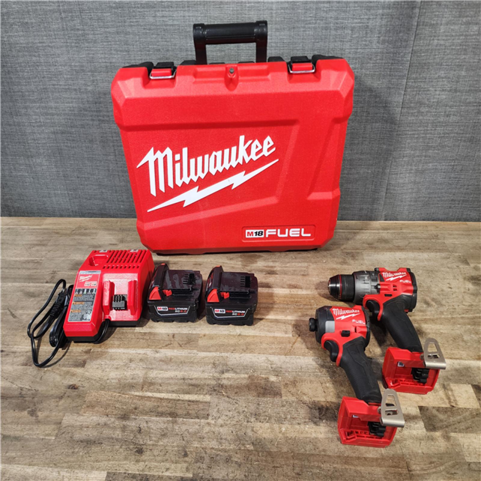 HOUSTON LOCATION - AS-IS MILWAUKEE FUEL 18V Lithium-Ion Brushless Cordless Hammer Drill and Impact Driver Combo Kit