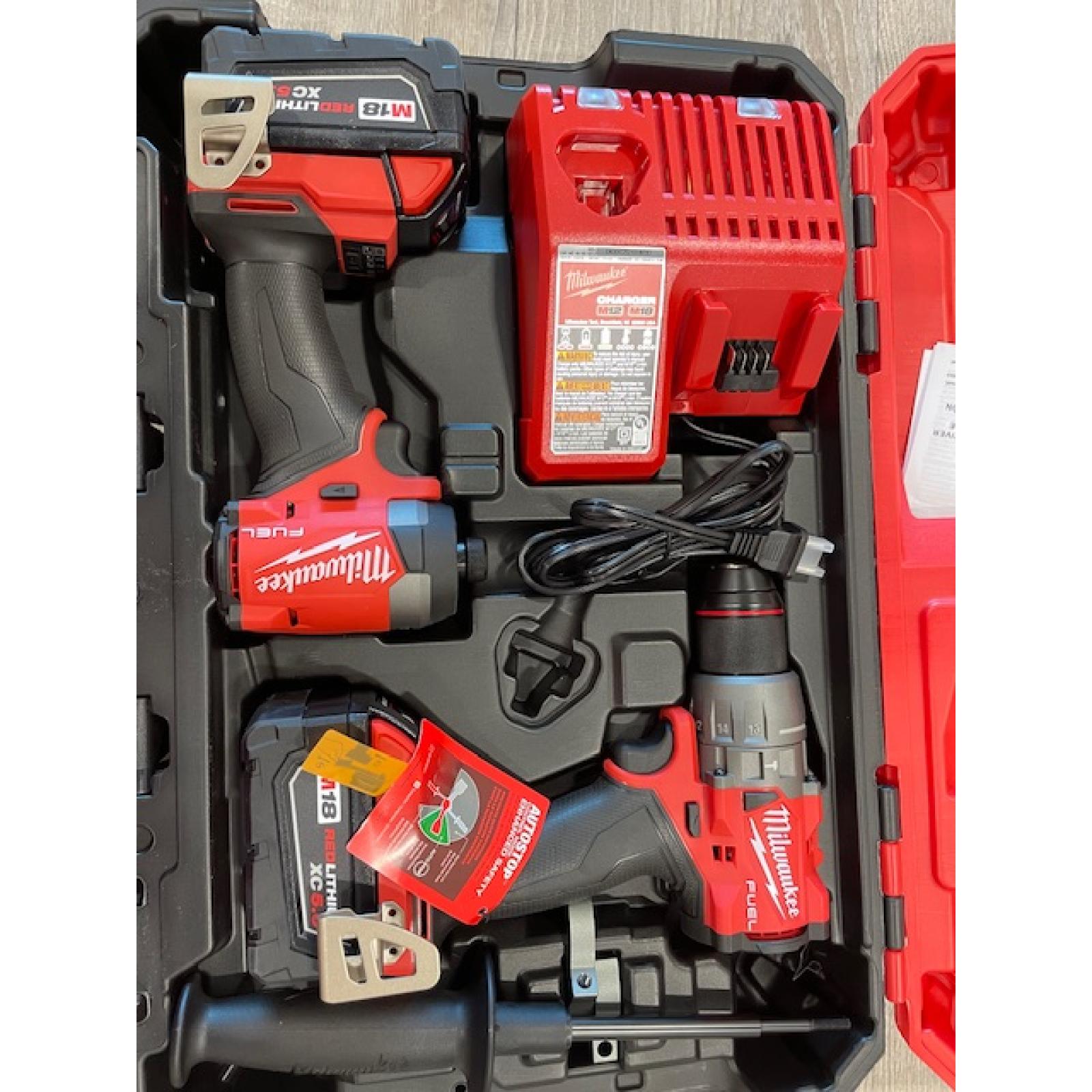 AS-IS Milwaukee FUEL 18V Lithium-Ion Brushless Cordless Hammer Drill and Impact Driver Combo Kit