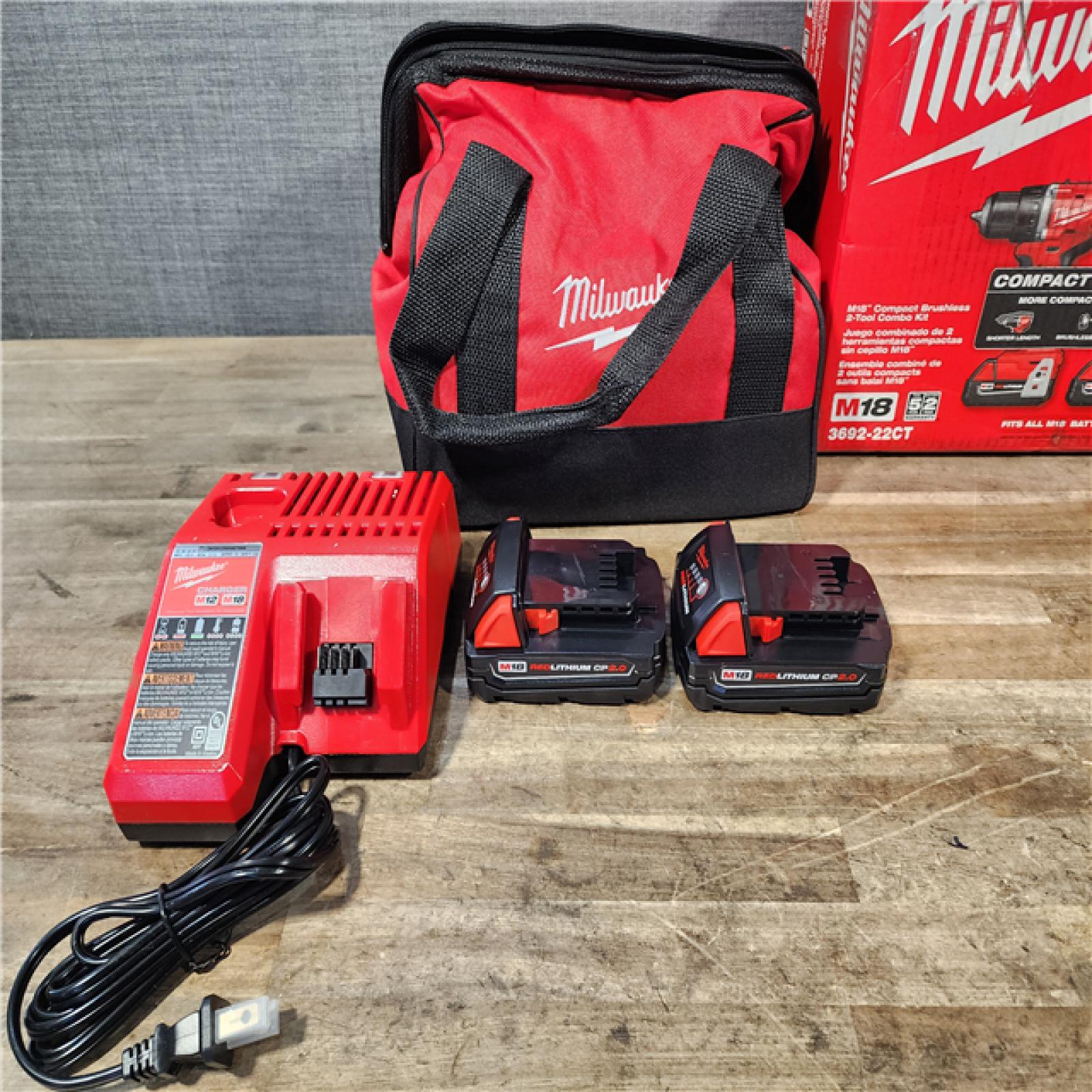 HOUSTON LOCATION - AS-IS Milwaukee M18 18V Lithium-Ion Brushless Cordless Compact Drill/Impact Combo Kit (2-Tool) W/(2) 2.0 Ah Batteries  Charger & Bag