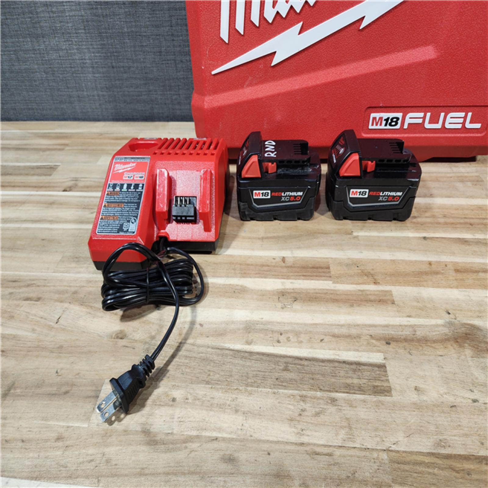 HOUSTON LOCATION - AS-IS Milwaukee FUEL 12-Volt Lithium-Ion Brushless Cordless Hammer Drill and Impact Driver Combo Kit