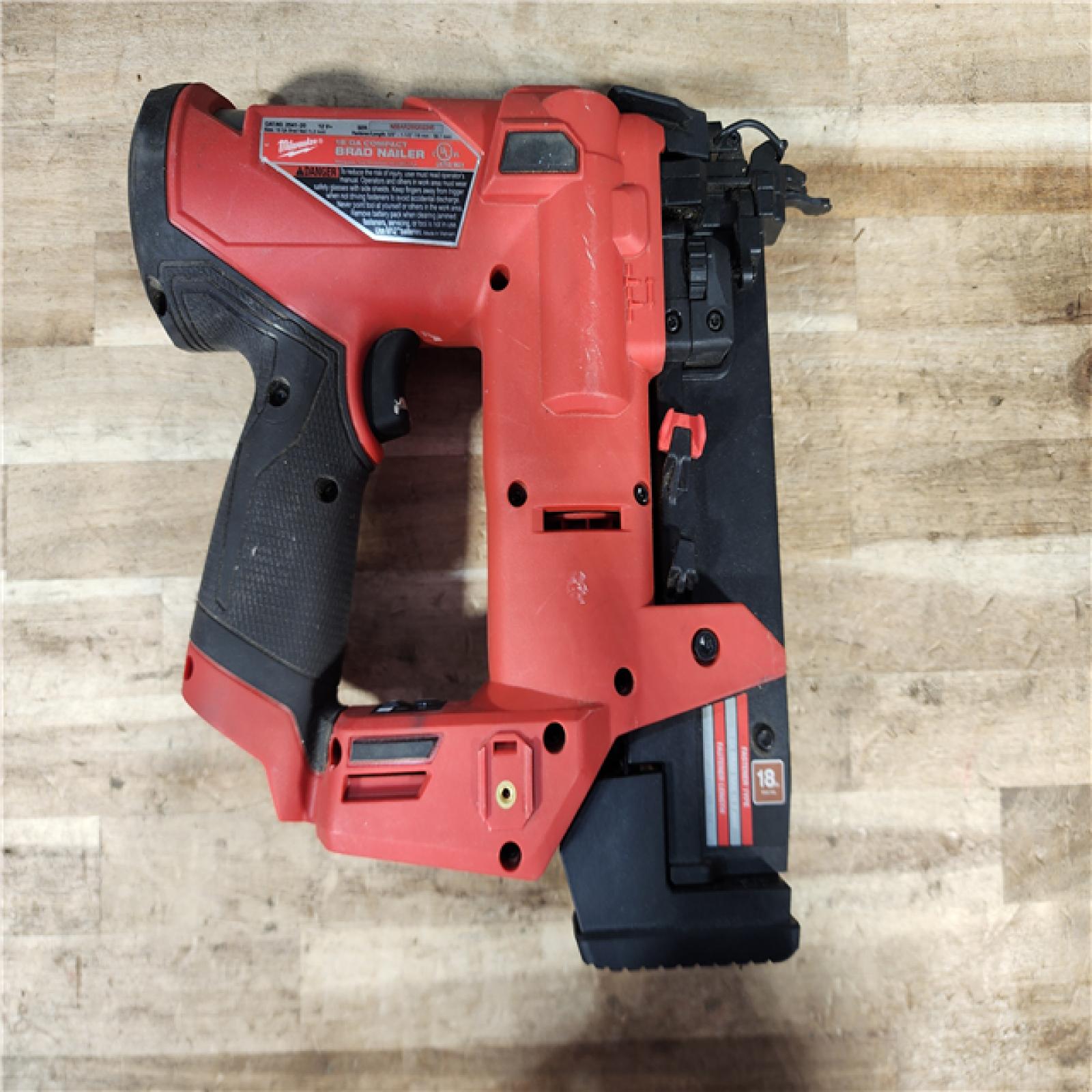 HOUSTON LOCATION - AS-IS Milwaukee FUEL 12-Volt Lithium-Ion Brushless Cordless 18-Gauge 1-1/2 in. Compact Brad Nailer (Tool Only)