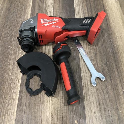 AS-IS Milwaukee FUEL 18V Lithium-Ion Brushless Cordless 4-1/2 in./5 in. Grinder w/Paddle Switch (Tool-Only)