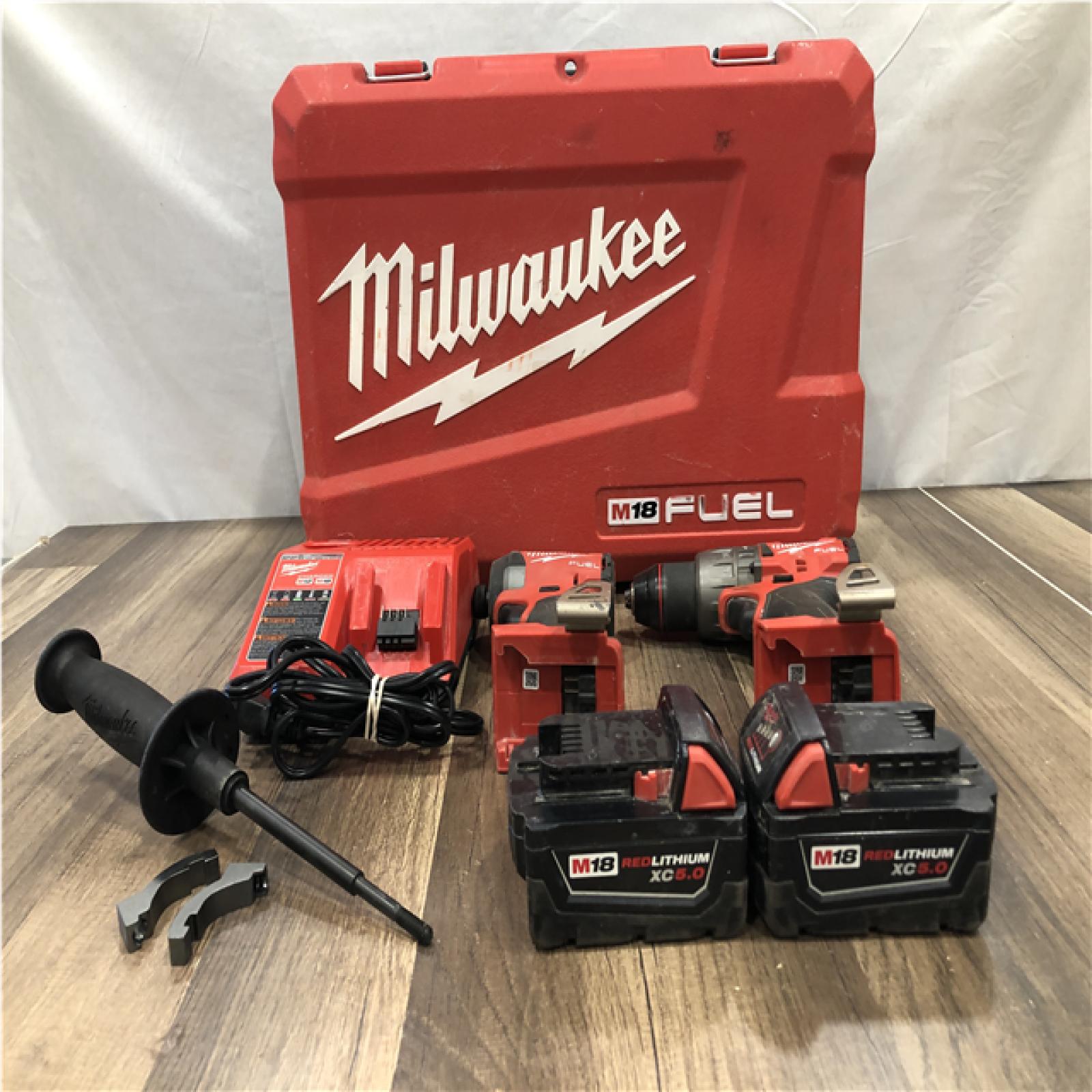 AS-IS Milwaukee FUEL 18V Lithium-Ion Brushless Cordless Hammer Drill and Impact Driver Combo Kit