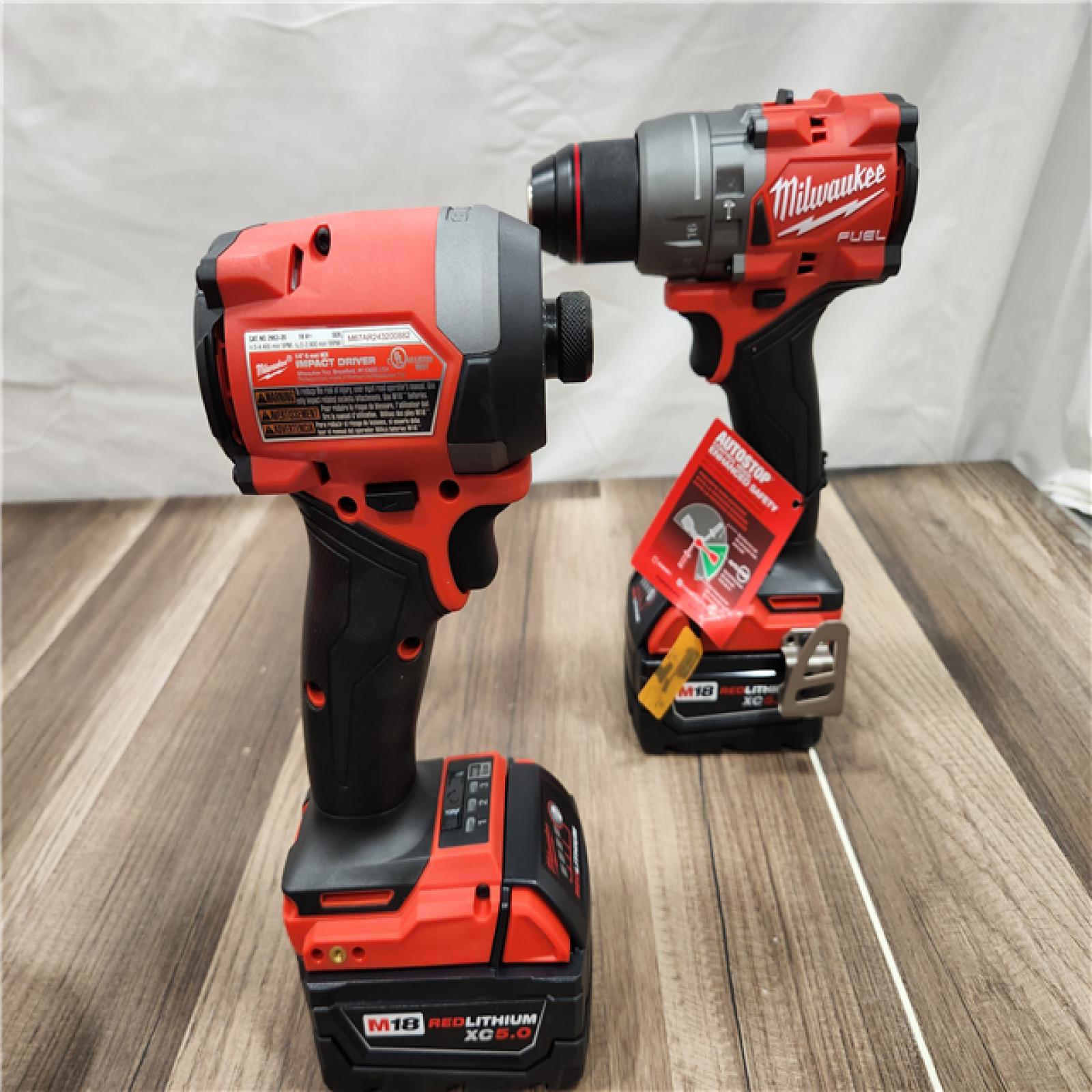 AS-IS  Milwaukee M18 FUEL 18V Lithium-Ion Brushless Cordless Hammer Drill and Impact Driver Combo Kit (2-Tool) with 2 Batteries