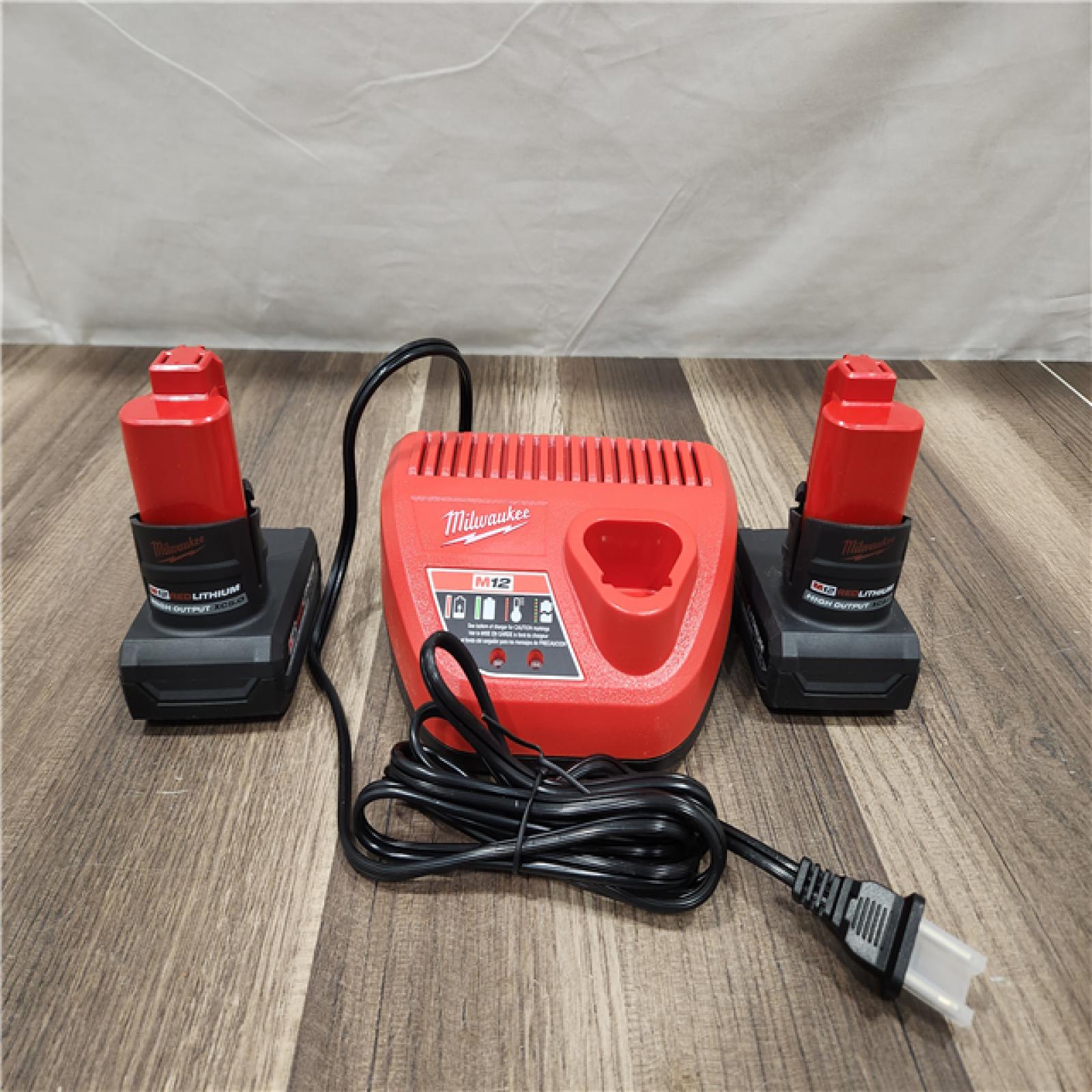 AS-IS- Milwaukee M12 12V Lithium-Ion XC High Output 5.0 Ah Battery Pack (2-Pack) Starter Kit with Charger