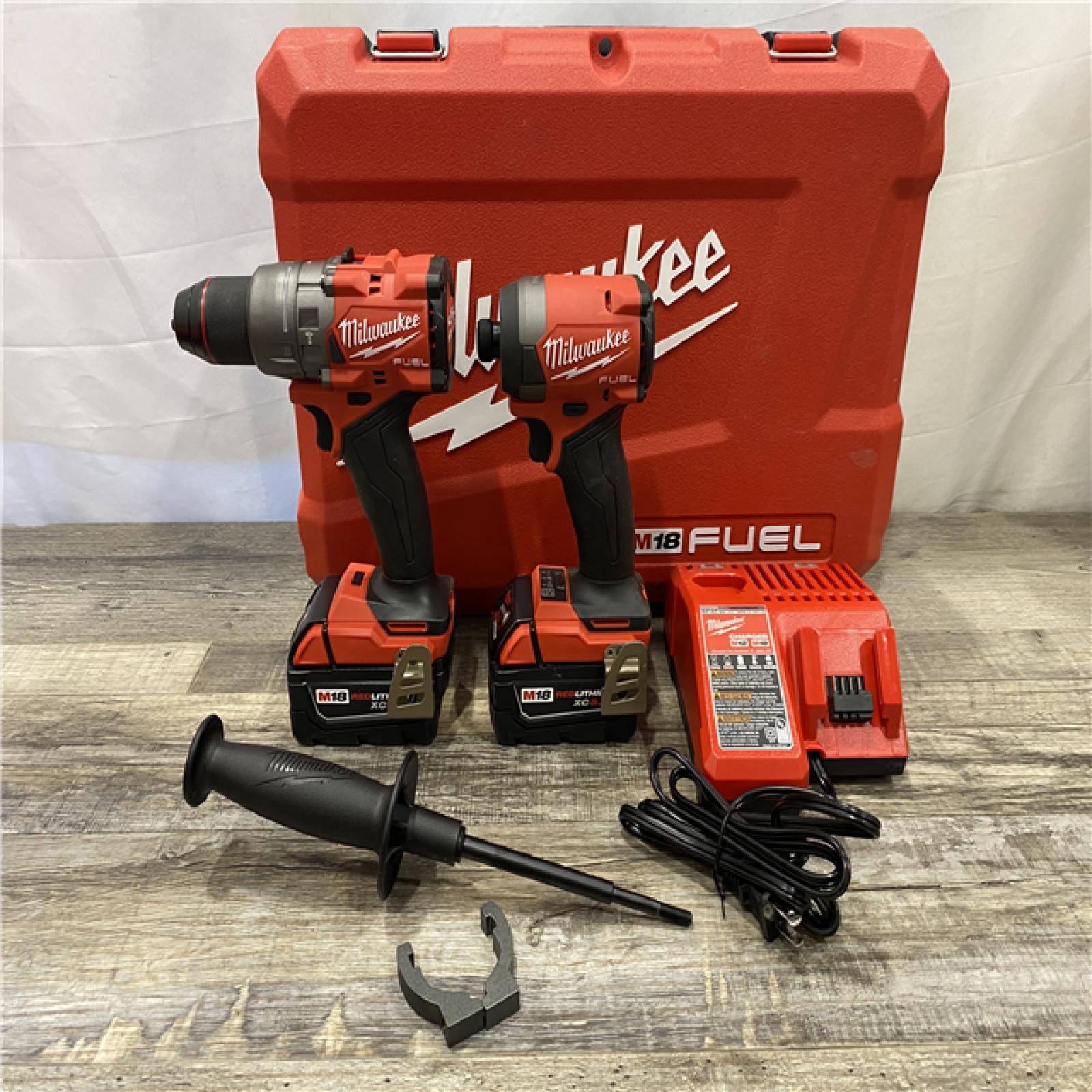 AS-IS Milwaukee FUEL 18V Lithium-Ion Brushless Cordless Hammer Drill and Impact Driver Combo Kit