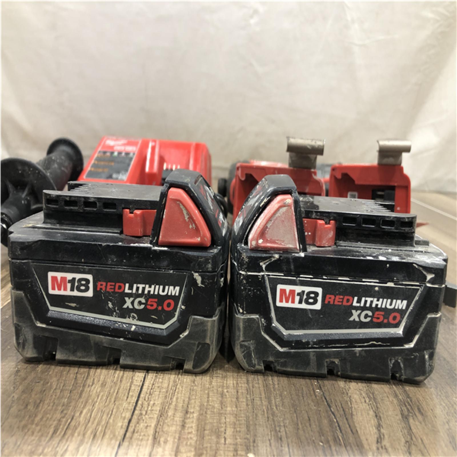 AS-IS Milwaukee FUEL 18V Lithium-Ion Brushless Cordless Hammer Drill and Impact Driver Combo Kit