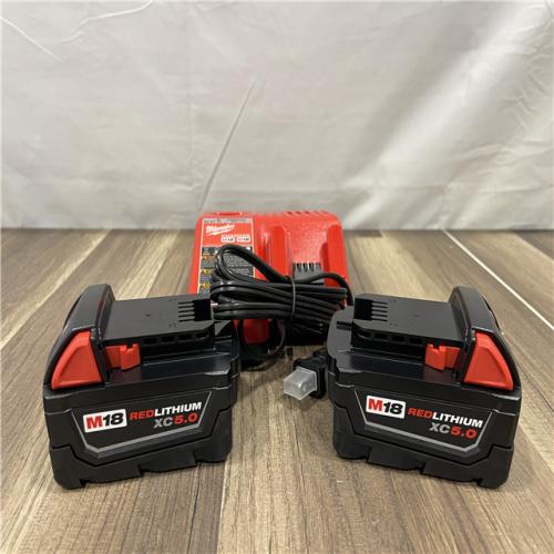 AS-IS Milwaukee M18 18-Volt Lithium-Ion XC Starter Kit with Two 5.0Ah Batteries and Charger