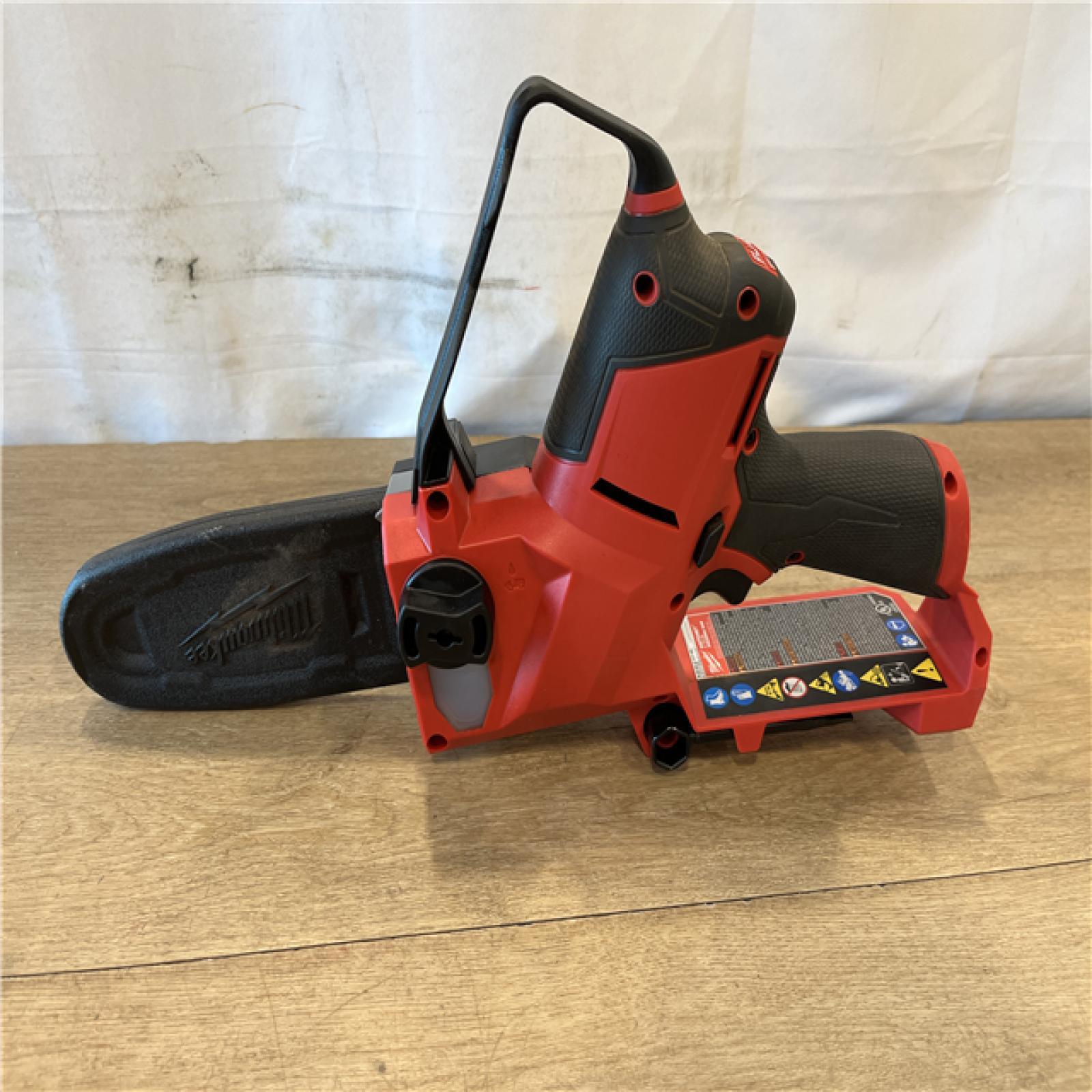 AS-IS Milwaukee FUEL 12V Lithium-Ion Brushless Battery 6 in. HATCHET Pruning Saw Kit