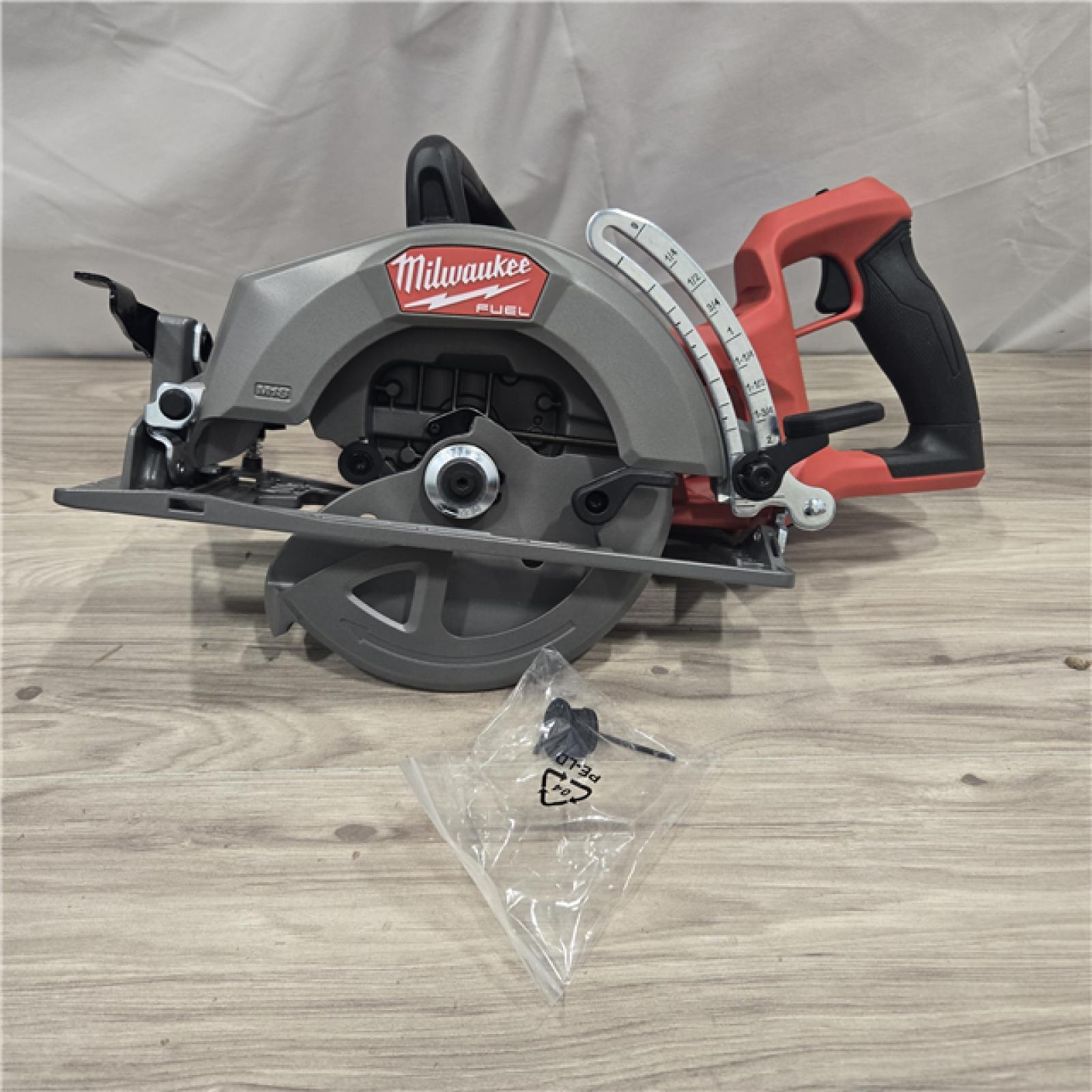 AS-IS MILWAUKEE 7-1/4 REAR HANDLE CIRCULAR SAW (TOOL ONLY)