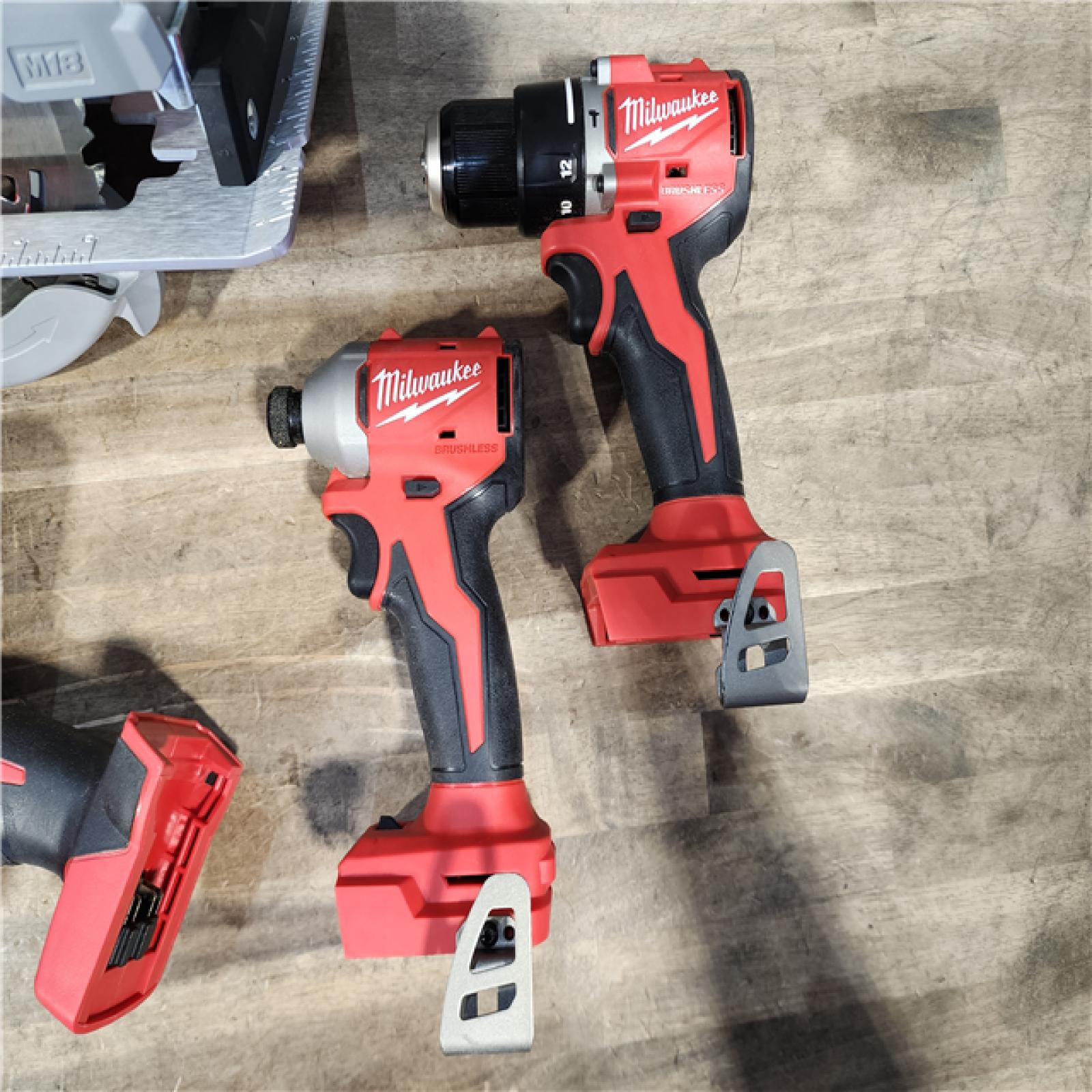 HOUSTON LOCATION - AS-IS Milwaukee M18 18-Volt Lithium-Ion Brushless Cordless Combo Kit (4-Tool) with 2-Batteries  1-Charger and Tool Bag
