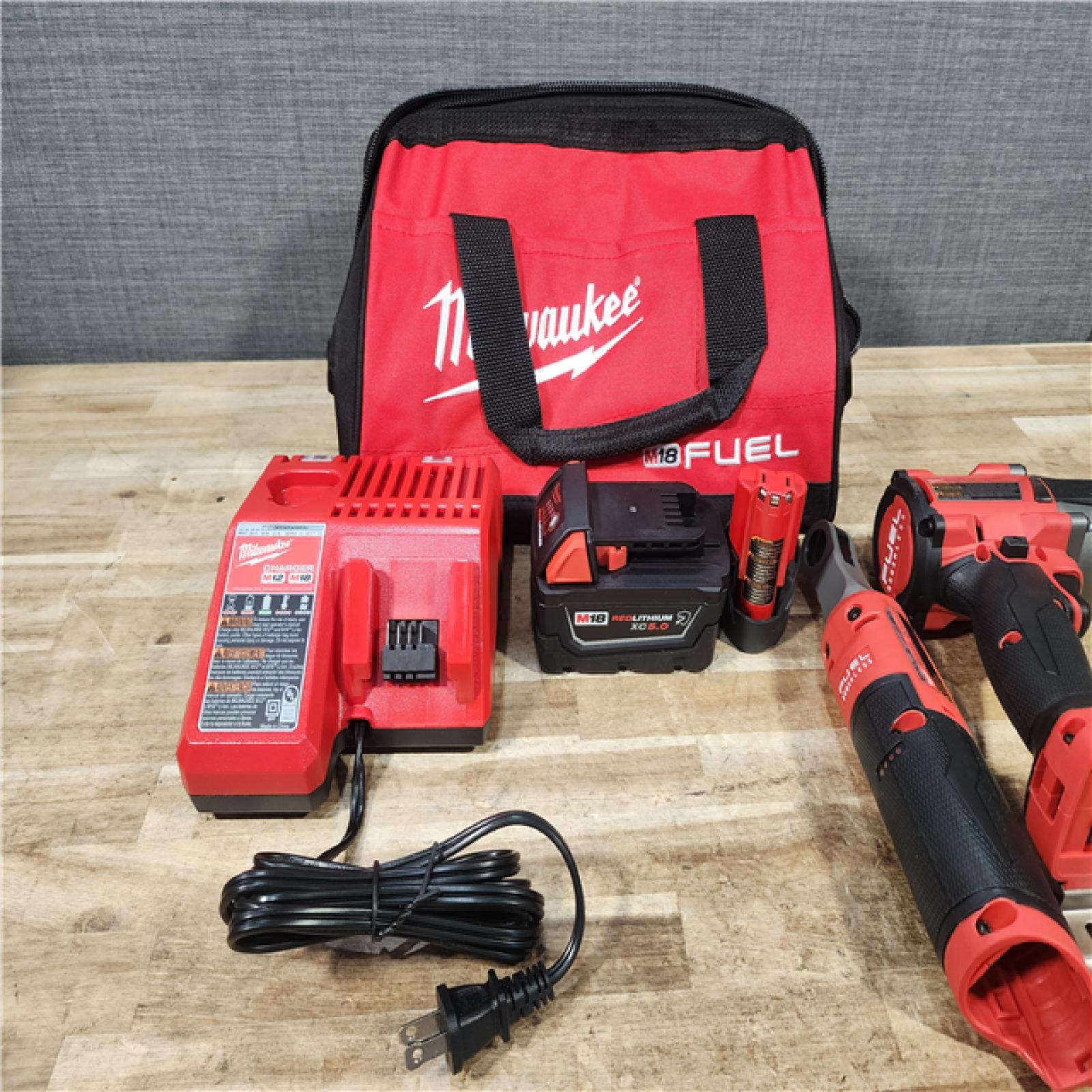 HOUSTON LOCATION - AS - IS Milwaukee FUEL 18V Cordless Mid Torque 1/2 in. Impact Wrench w/ 12 FUEL 3/8 in. Ratchet Combo Kit