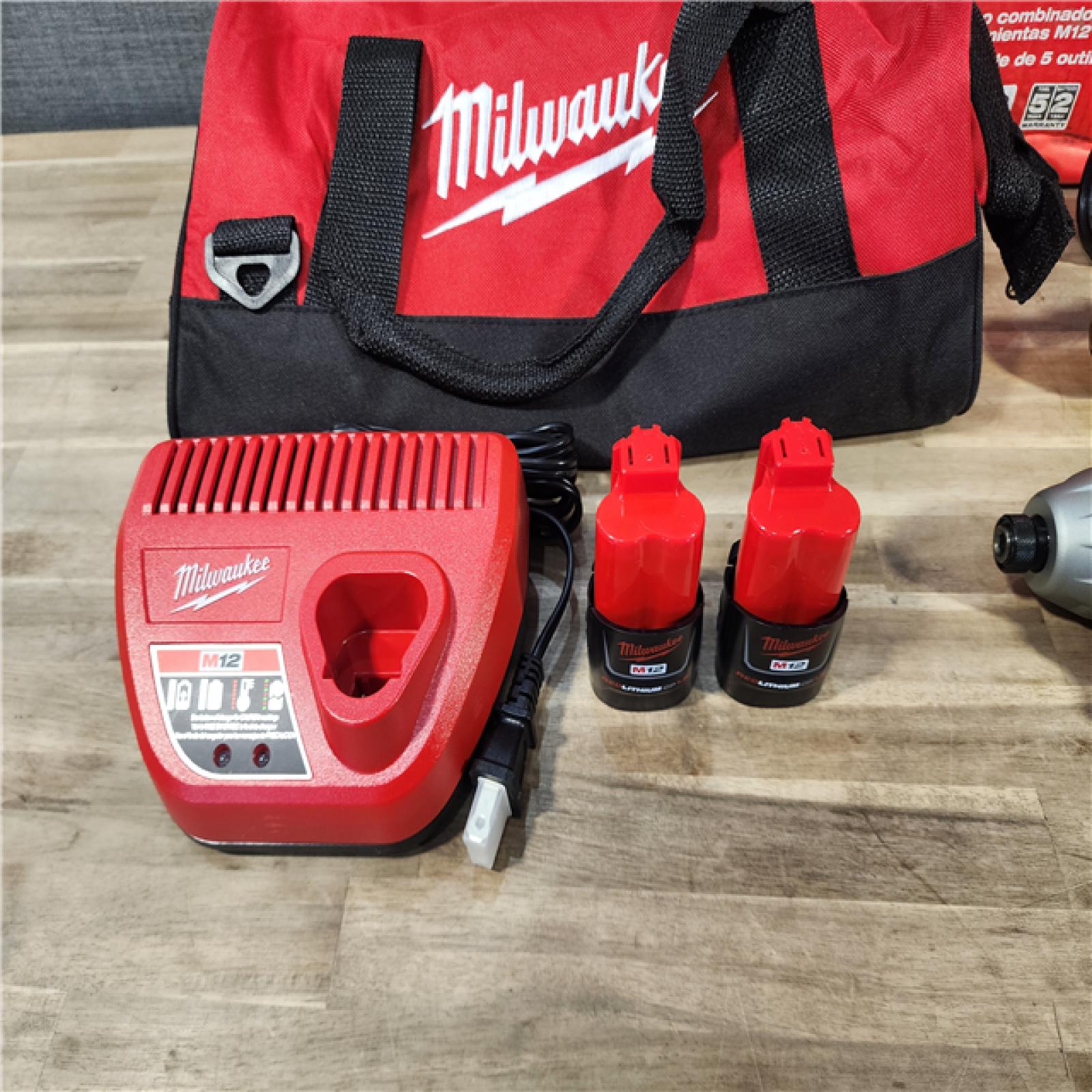 HOUSTON LOCATION - AS-IS (APPEARS LIKE NEW) MILWAUKEE M12 12V Lithium-Ion Cordless Combo Kit (5-Tool) with Two 1.5Ah Batteries, Charger & Tool Bag