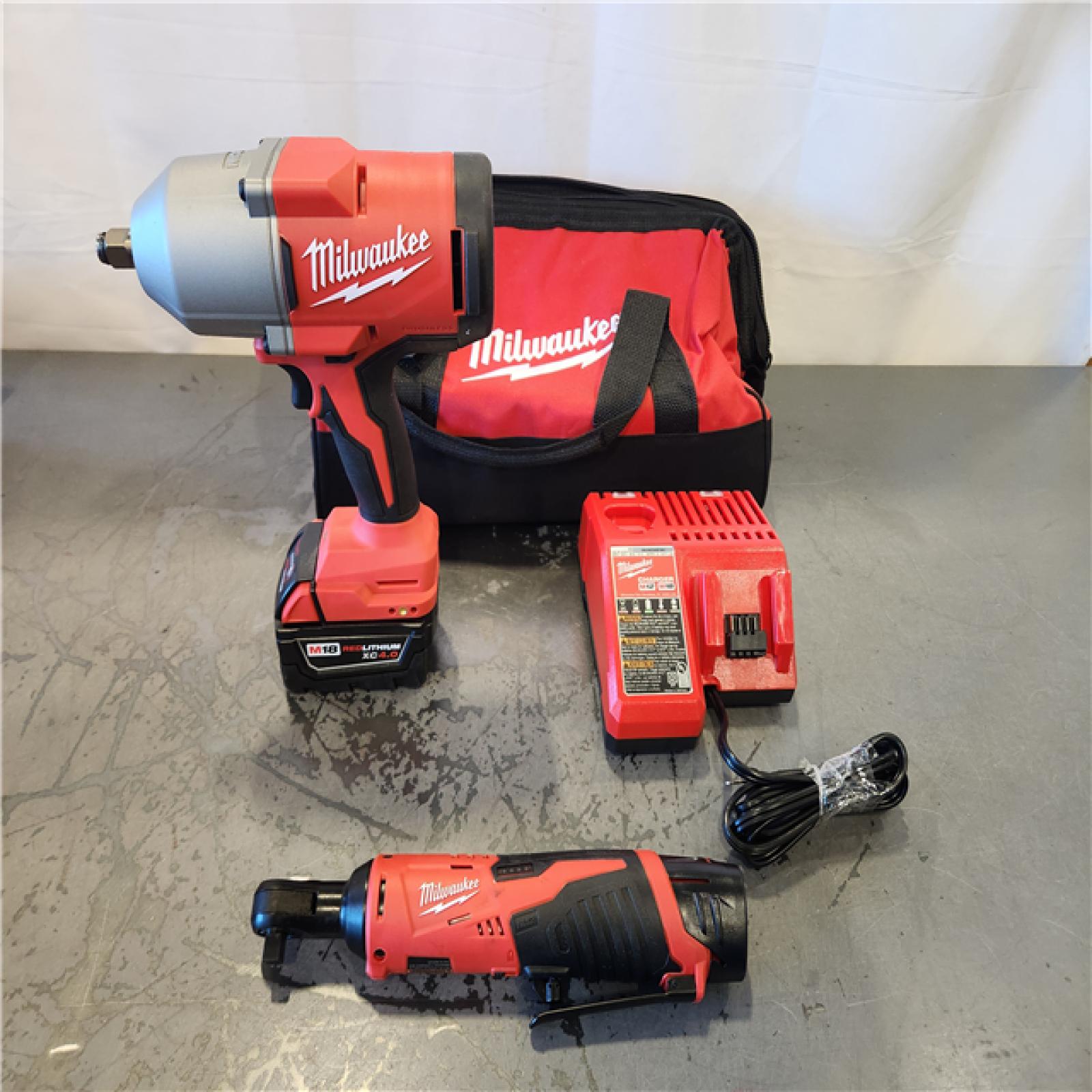 AS-IS- Milwaukee 12/18V Lithium-Ion Cordless 3/8 in. Ratchet and 1/2 in. High Torque Impact Wrench with Friction Ring Combo Kit