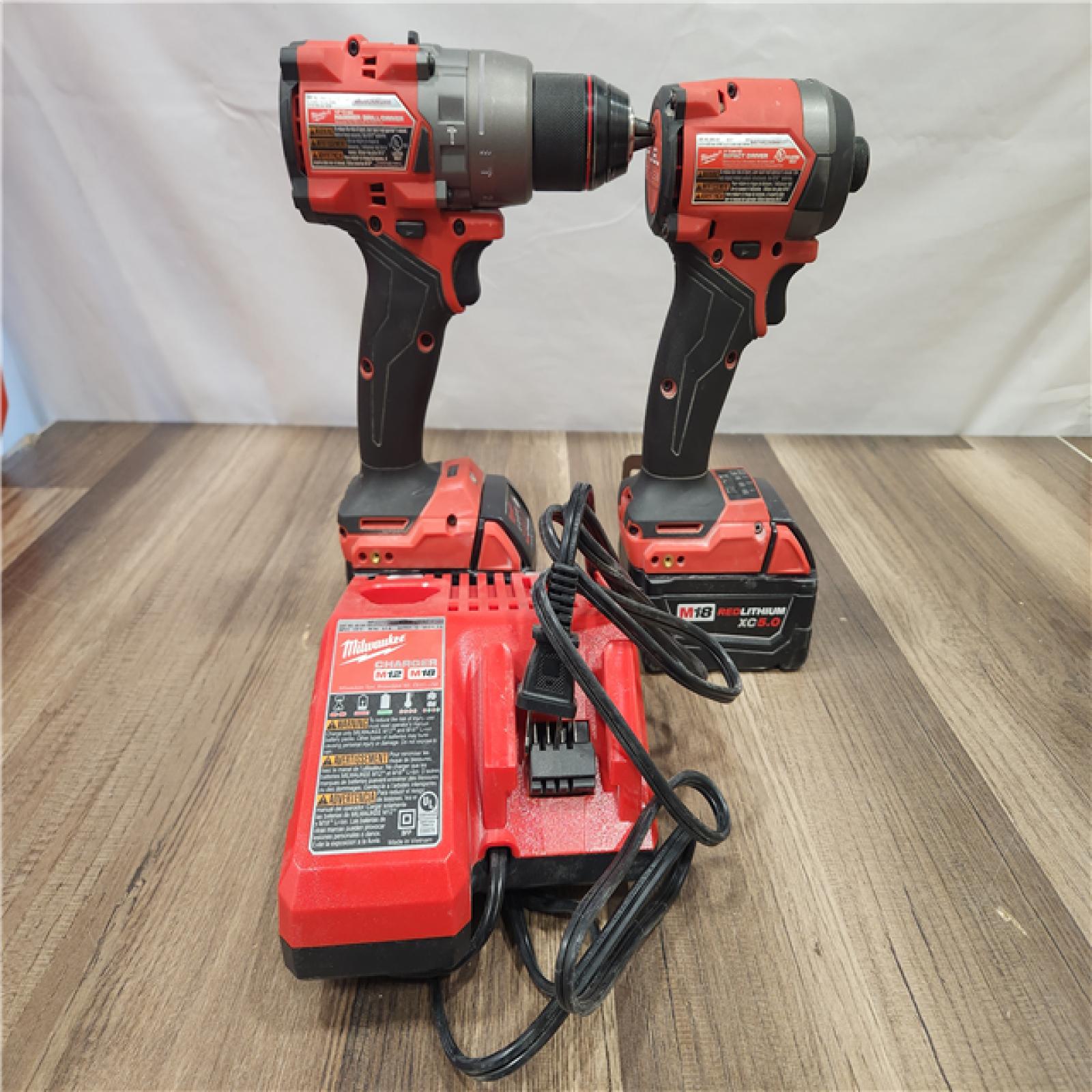 AS-IS- MILWAUKEE FUEL 18V Lithium-Ion Brushless Cordless Hammer Drill and Impact Driver Combo Kit