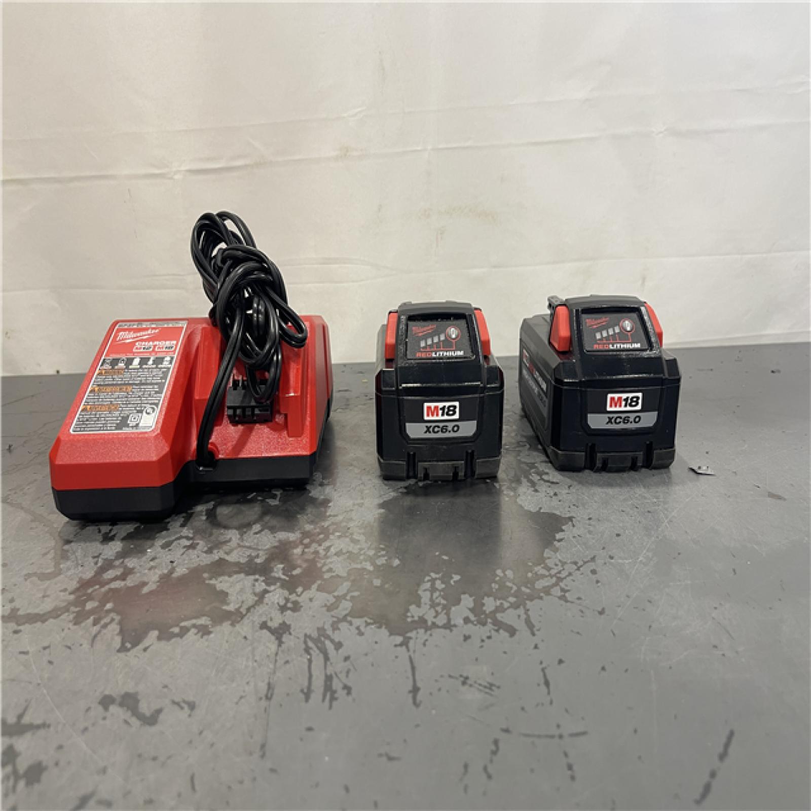 AS-IS- Milwaukee M18 Red Lithium High Output XC6.0 System Starter Kit