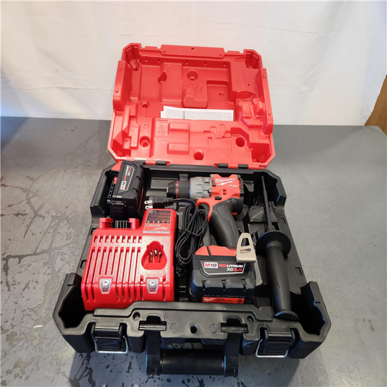 AS-IS- Milwaukee Hammer Drill Driver Kit with Batteries  Charger & Tool Case  Red