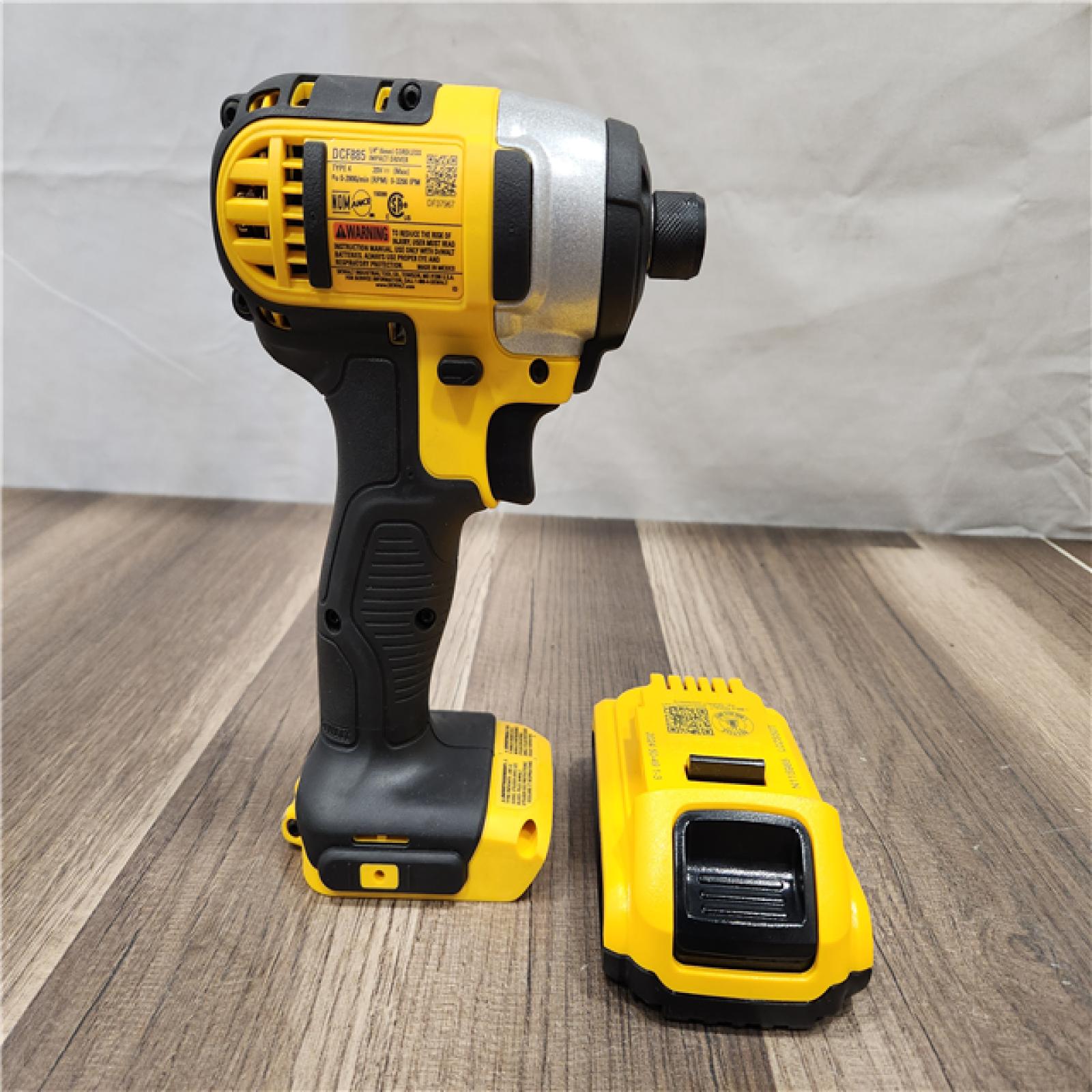 AS-IS- DeWALT ATOMIC 20V MAX Cordless Compact Impact Driver Kit W/ Li-Ion 2ah Battery  1/4  Brushless