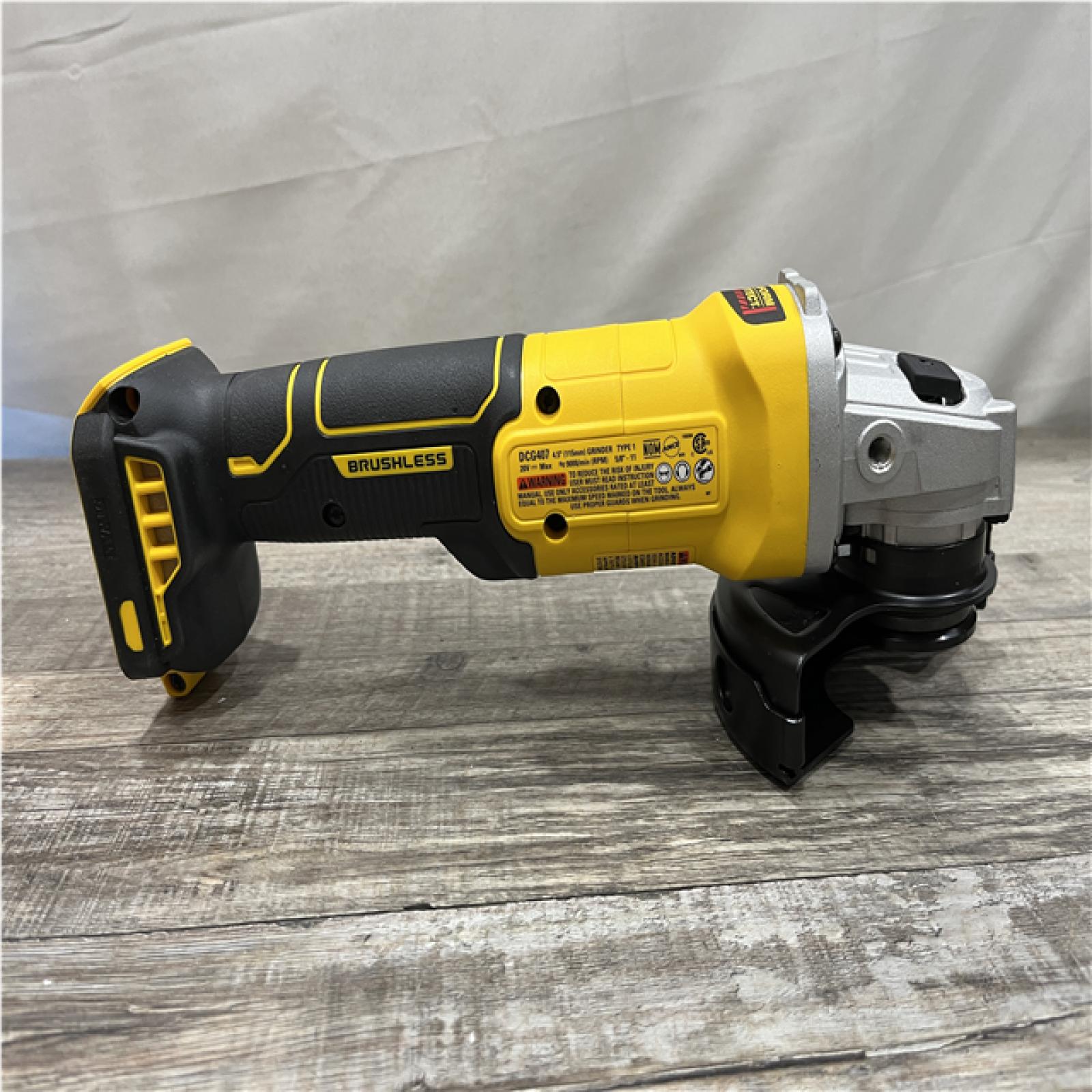 AS-IS DEWALT 20-Volt MAX Cordless Brushless 4-1/2 in. Angle Grinder with Slide Switch (Tool Only)